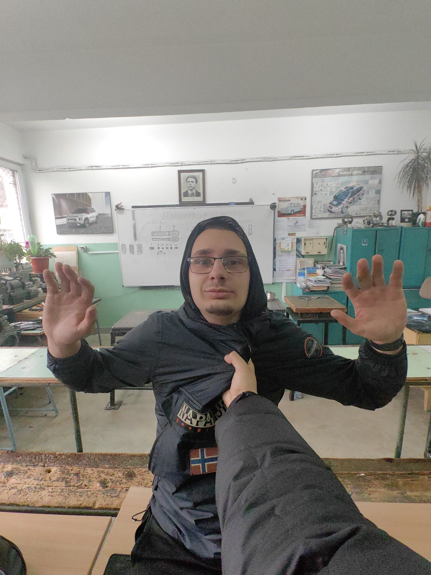 Friends take playful selfies in Sofia classroom