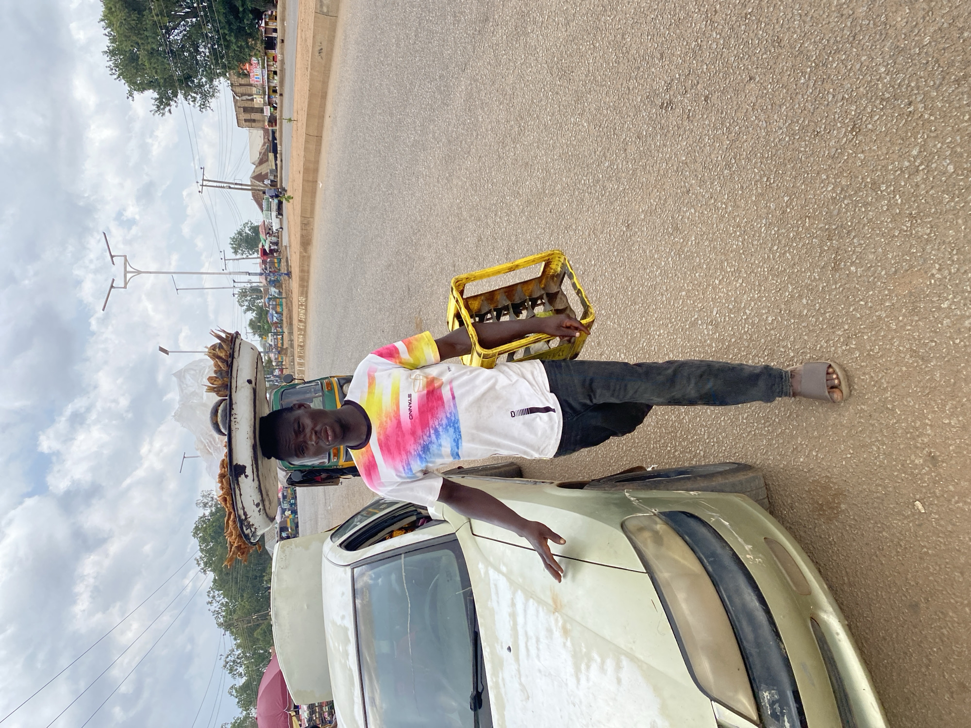 Bukuru street market buzzing with vendors and foot traffic
