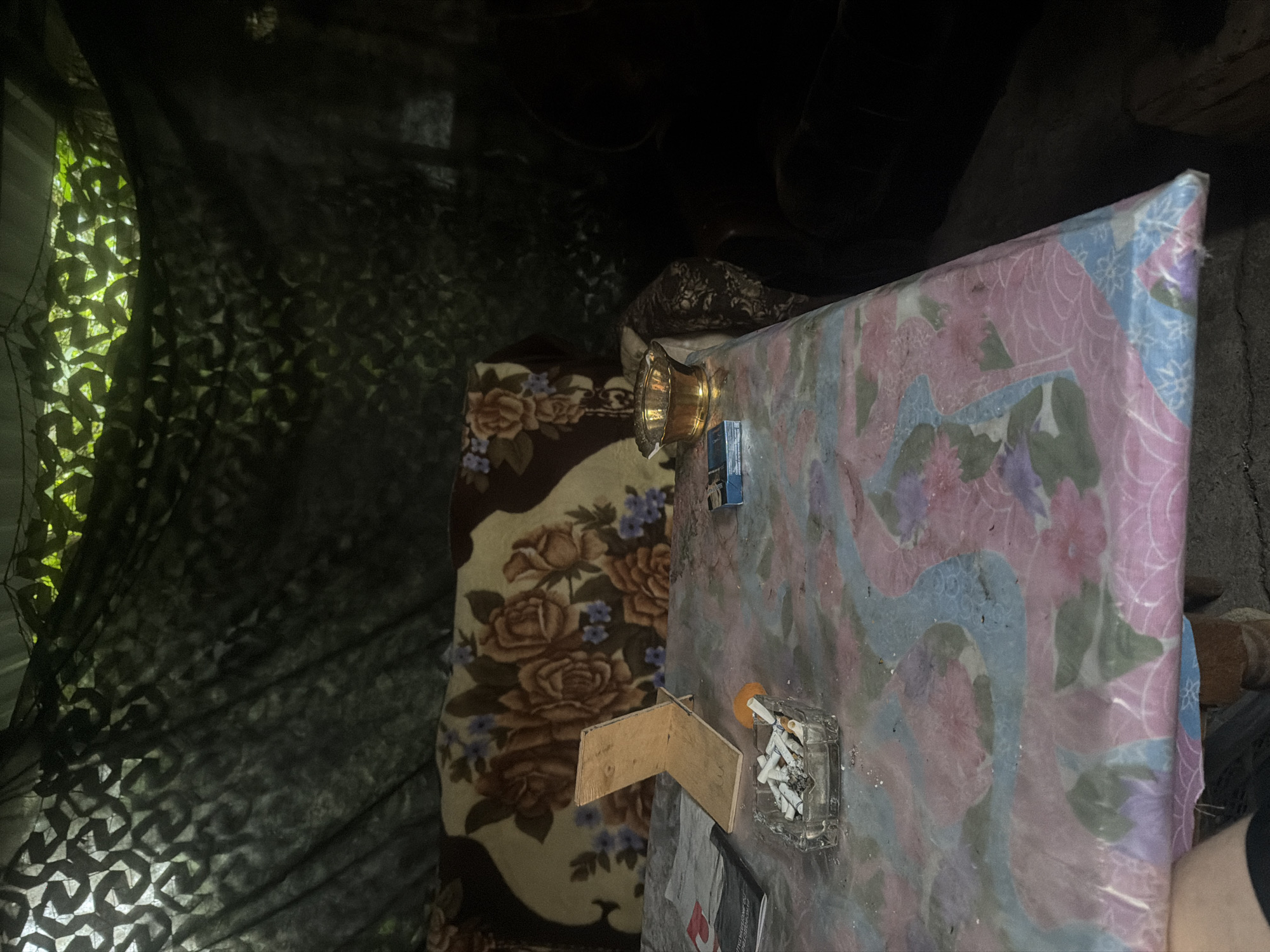 Backyard hangout scene with one unusual munitions room outlier
