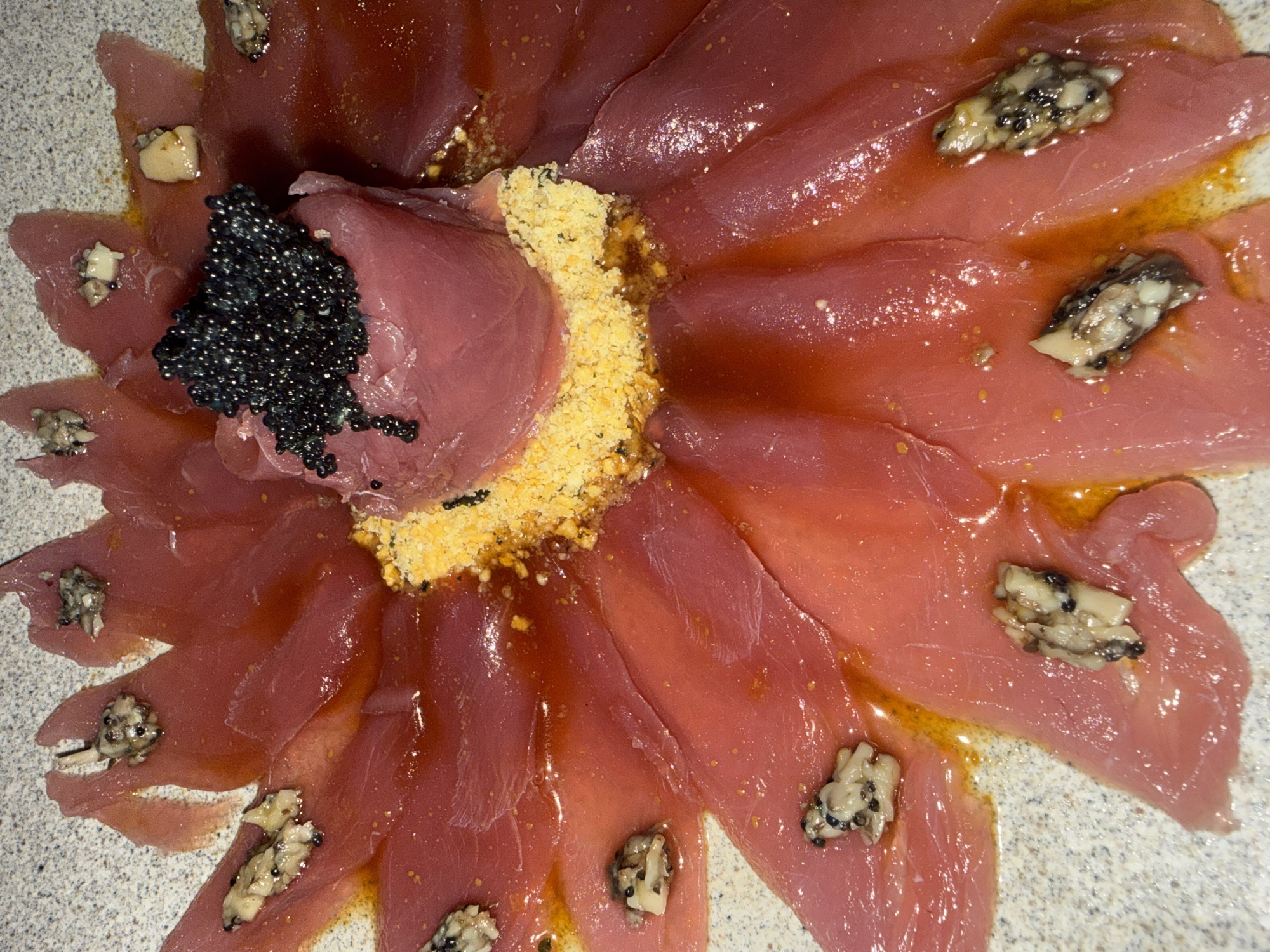 Gourmet tuna sashimi plated flower-style in Kuta Selatan