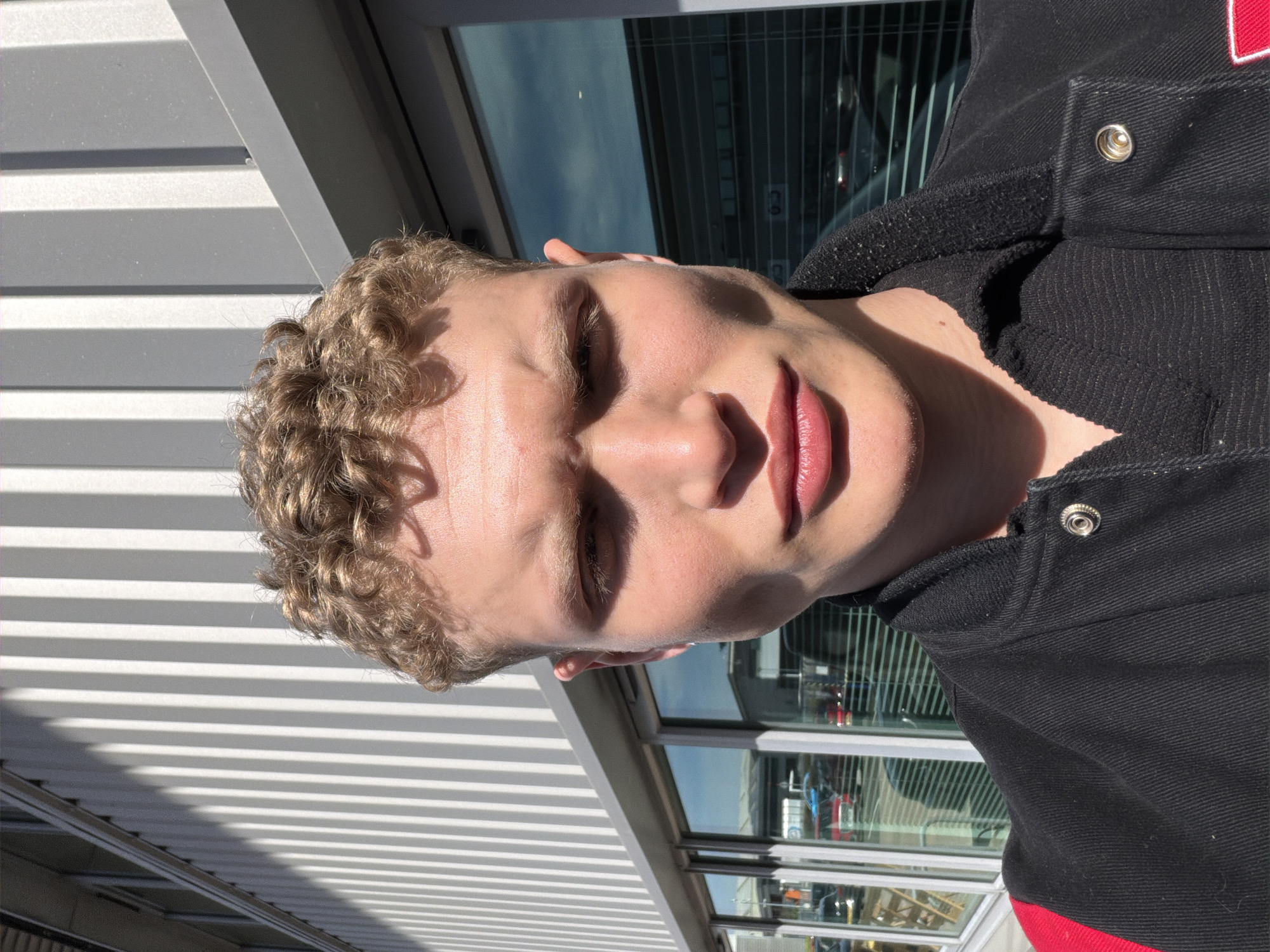 Person takes mirror selfie in Trafford showing different reflection