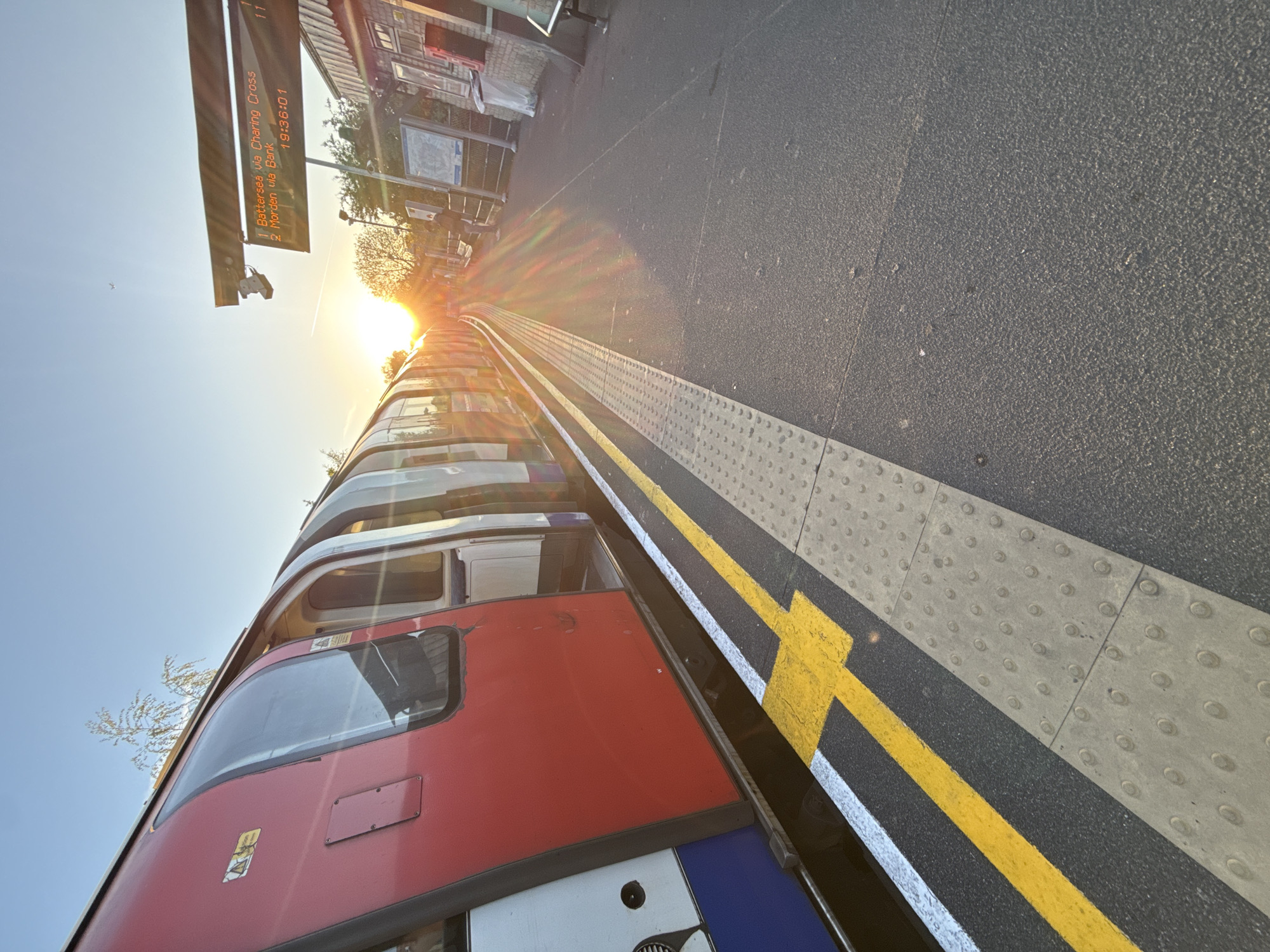 Evening commute captured at London Underground station platform