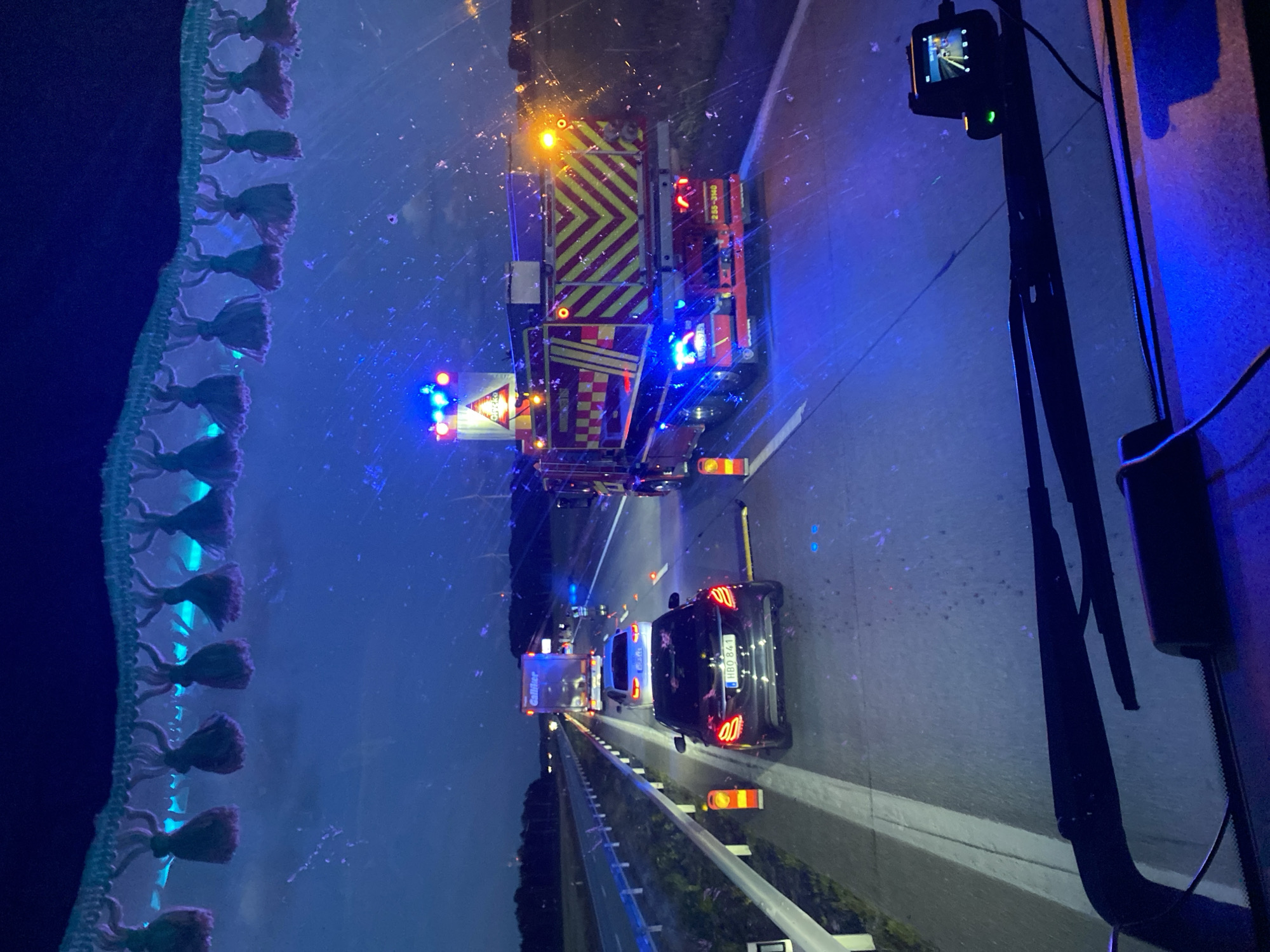 Fire truck and police on E6 highway near Långås at night