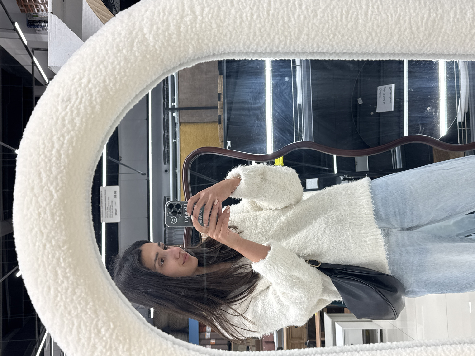 Woman Takes Tilted Mirror Selfie in Montenegro