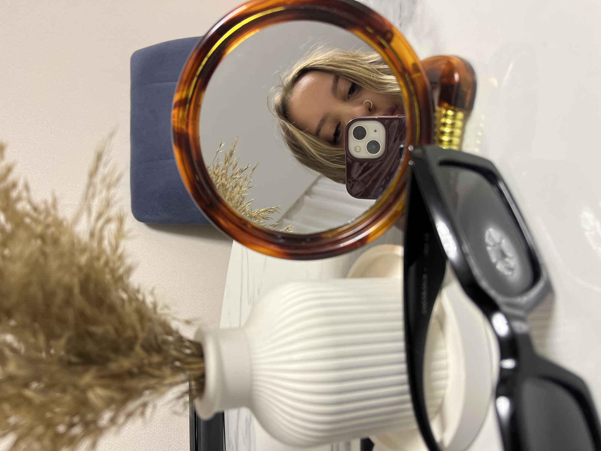 Person takes mirror selfies indoors in Krasnodar, Russia