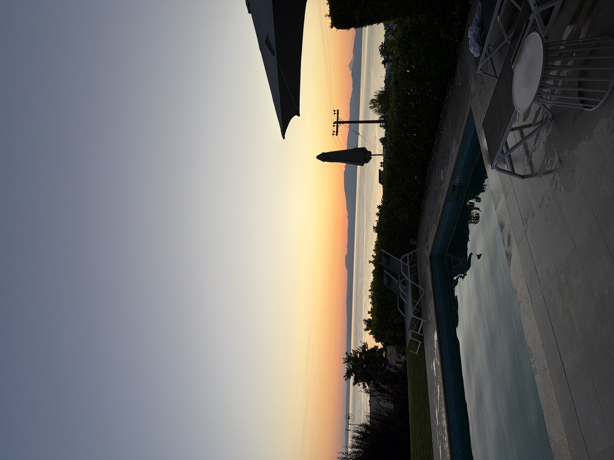 Twilight poolside views over the Greek sea, Pallini