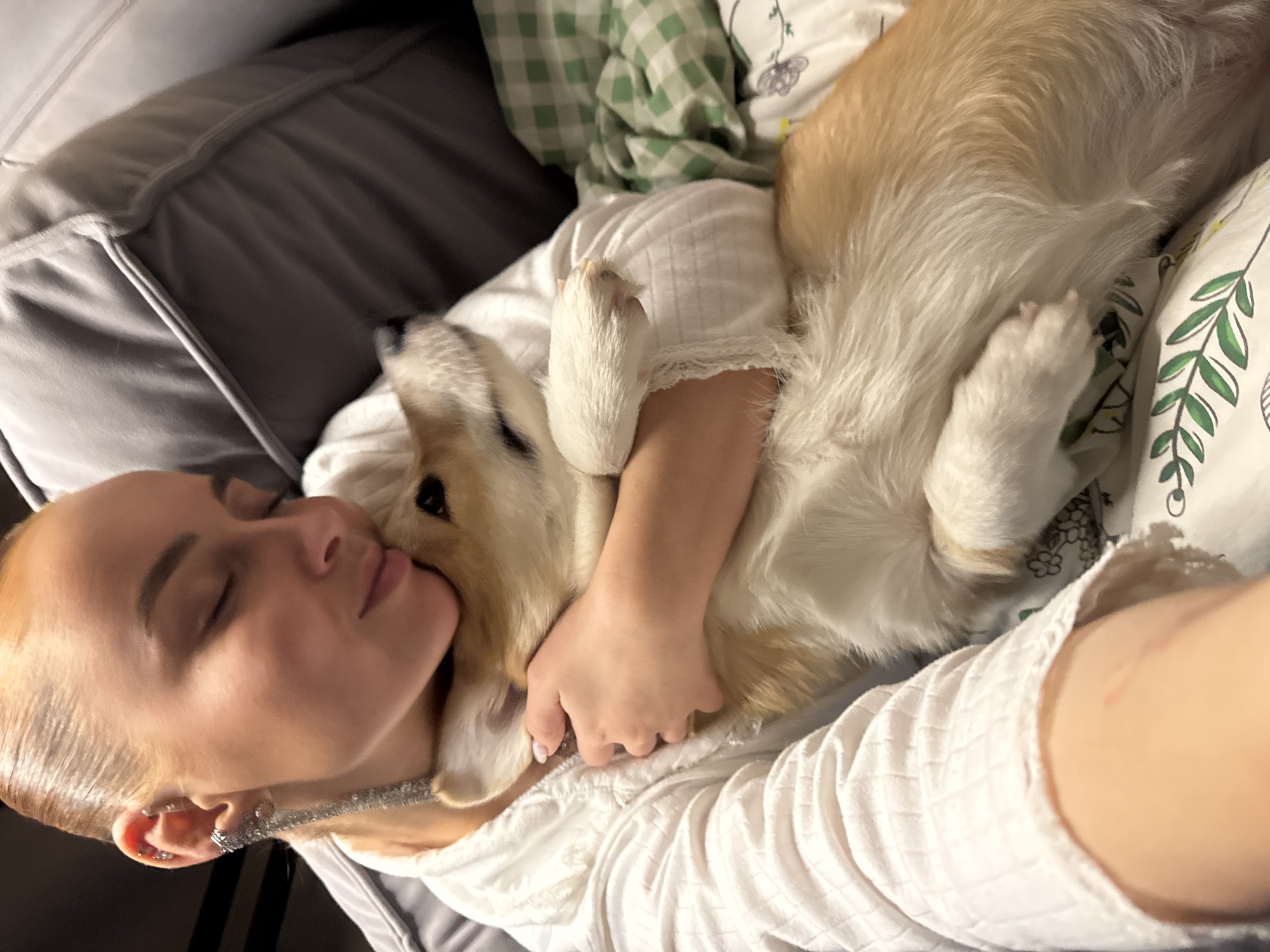 Woman and Corgi share quiet moment in Chaikovsky home