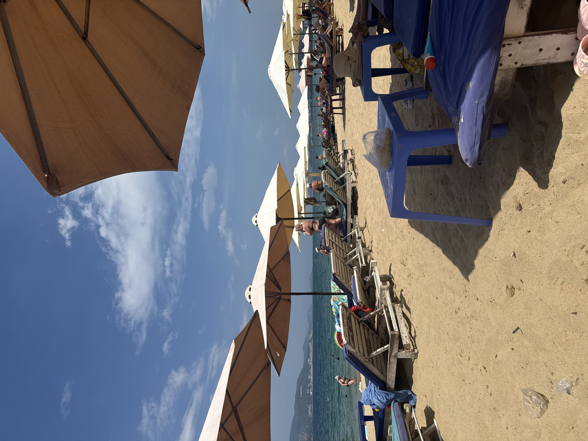 Early morning beach life at Nha Trang, vendors and all