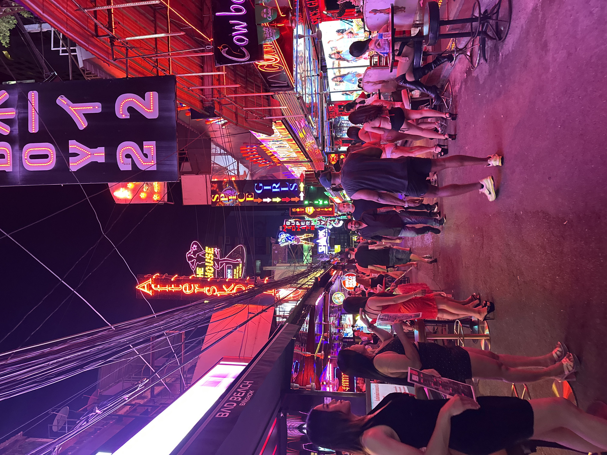 Bangkok red-light district shows typical evening crowd activity