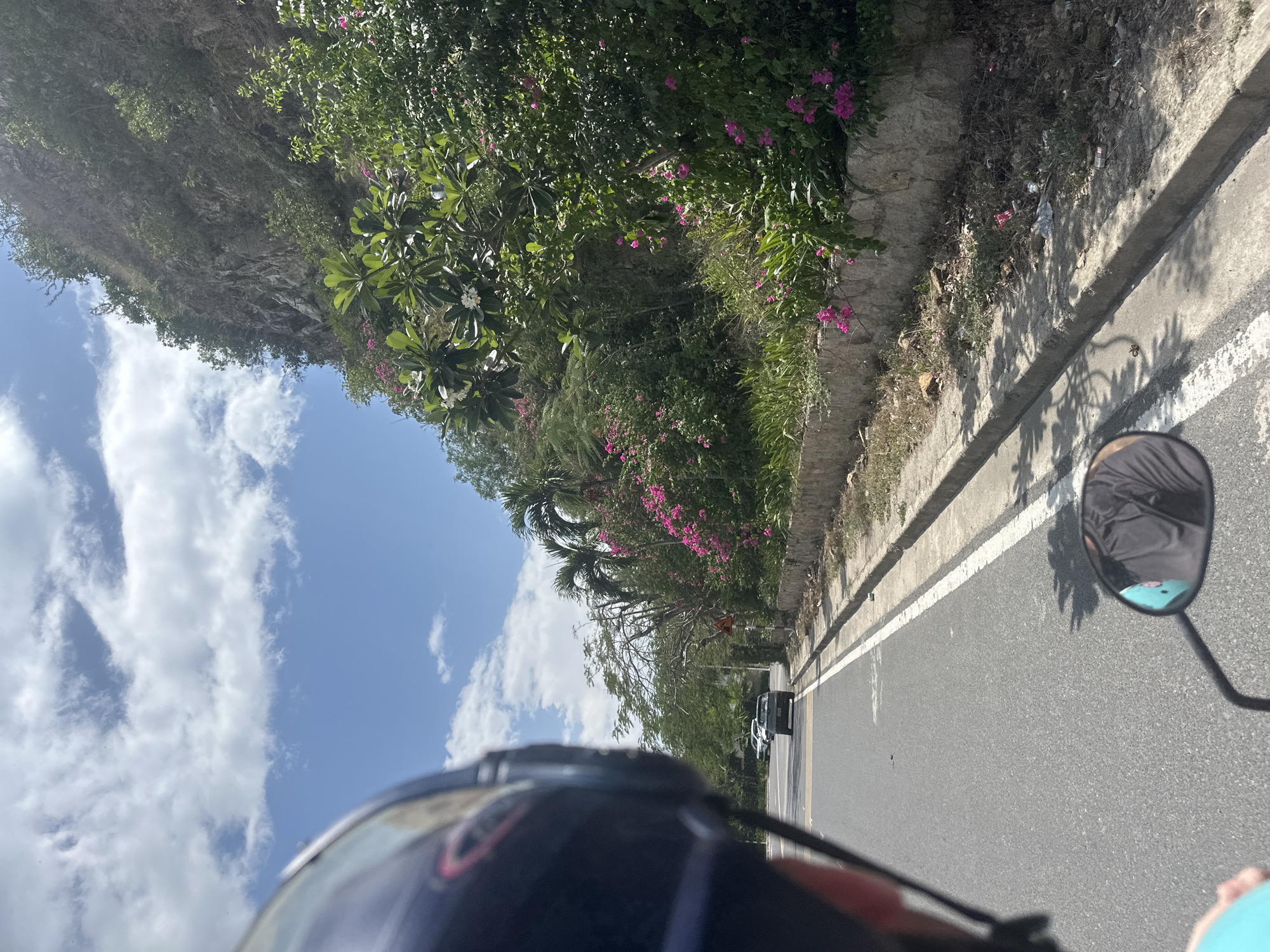 Riding a coastal road through Nha Trang on a sunny morning