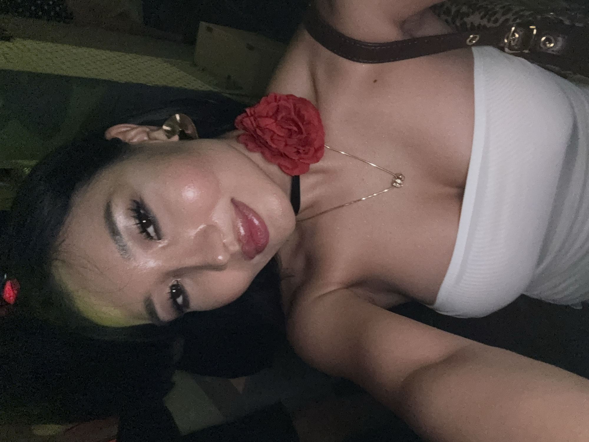Woman takes selfie, man plays electronic music in North Kuta