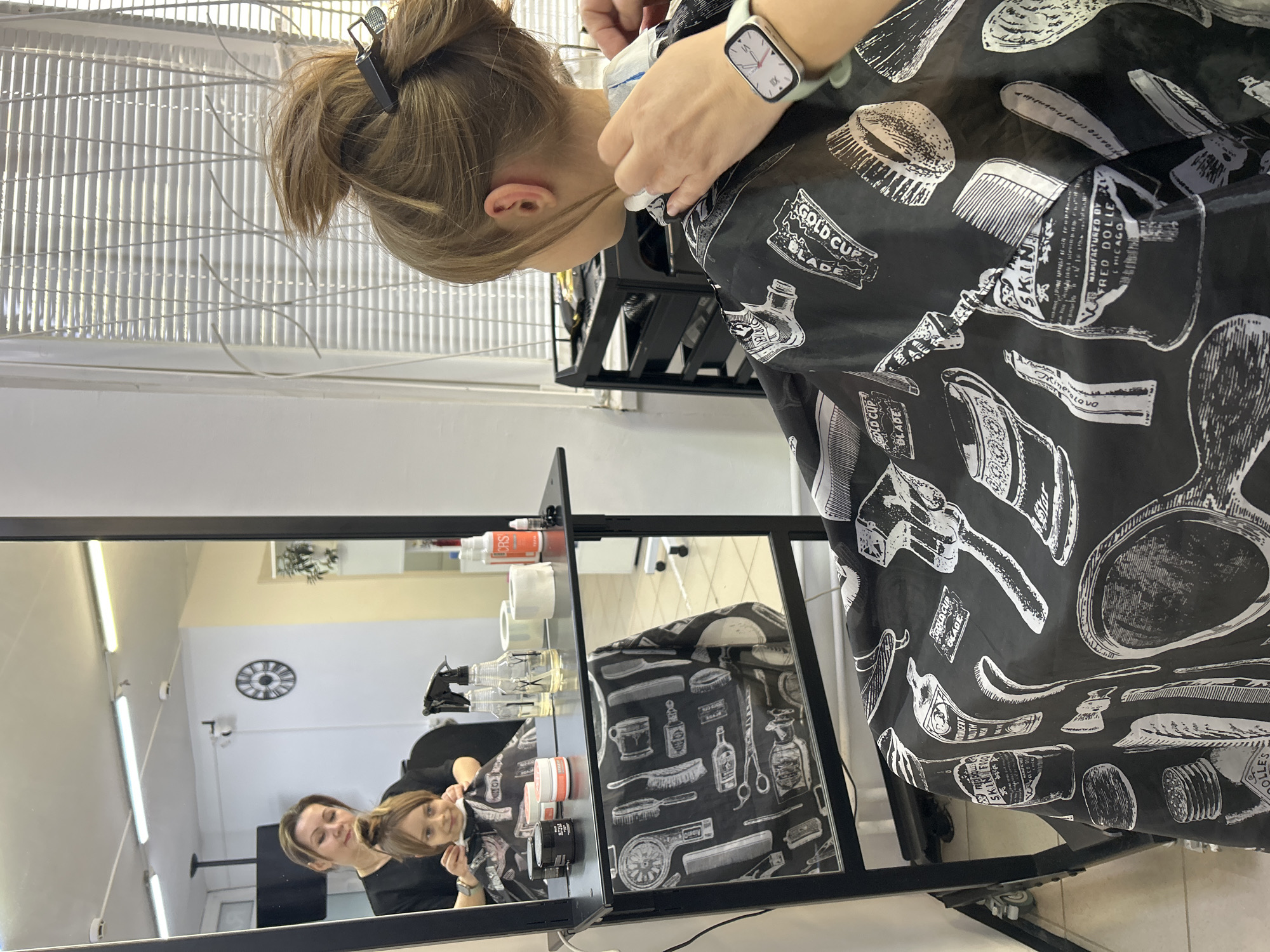 Woman gets haircut and styling at Moscow salon