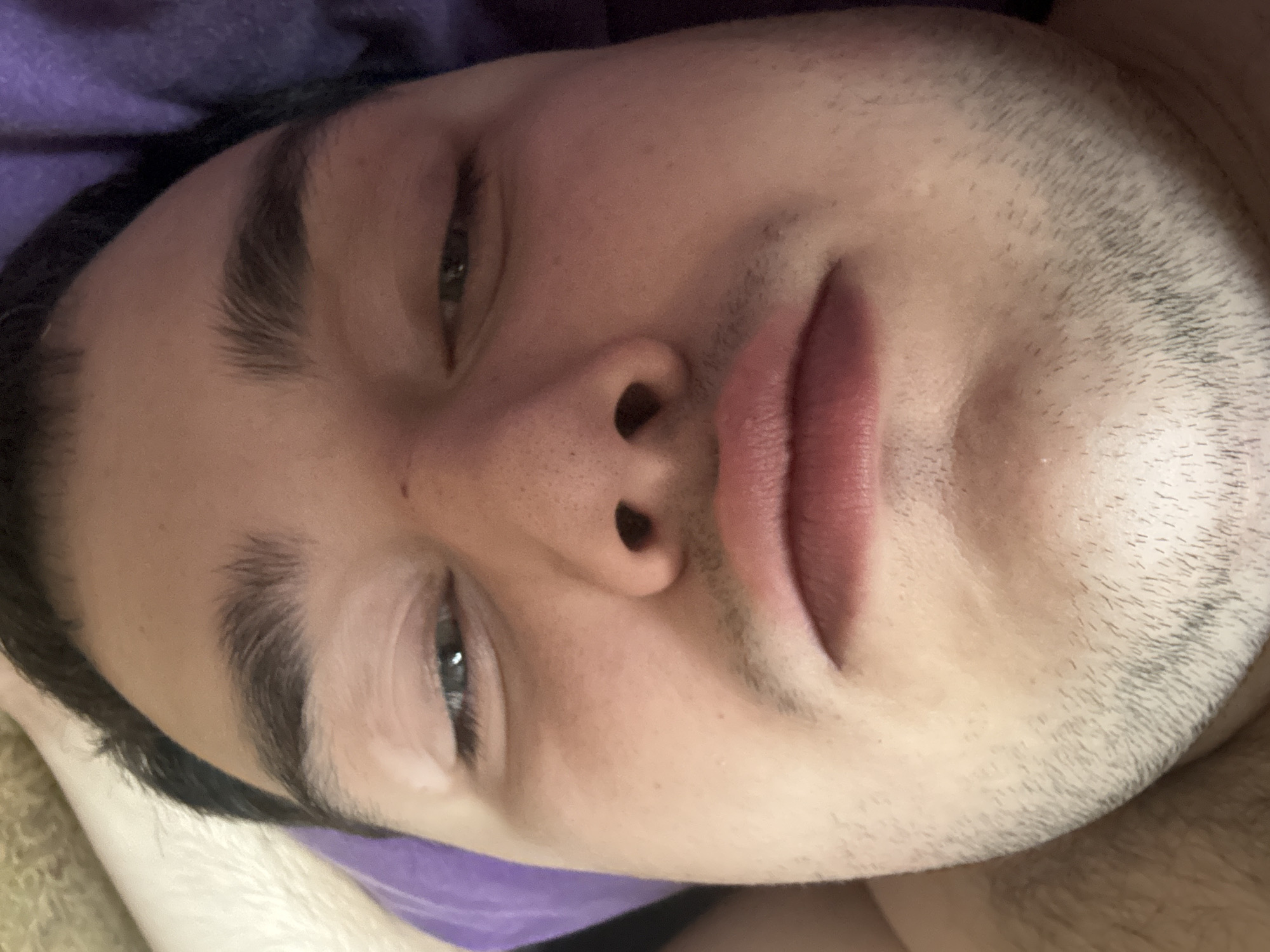 Close-up selfie session from a bedroom, July 2026