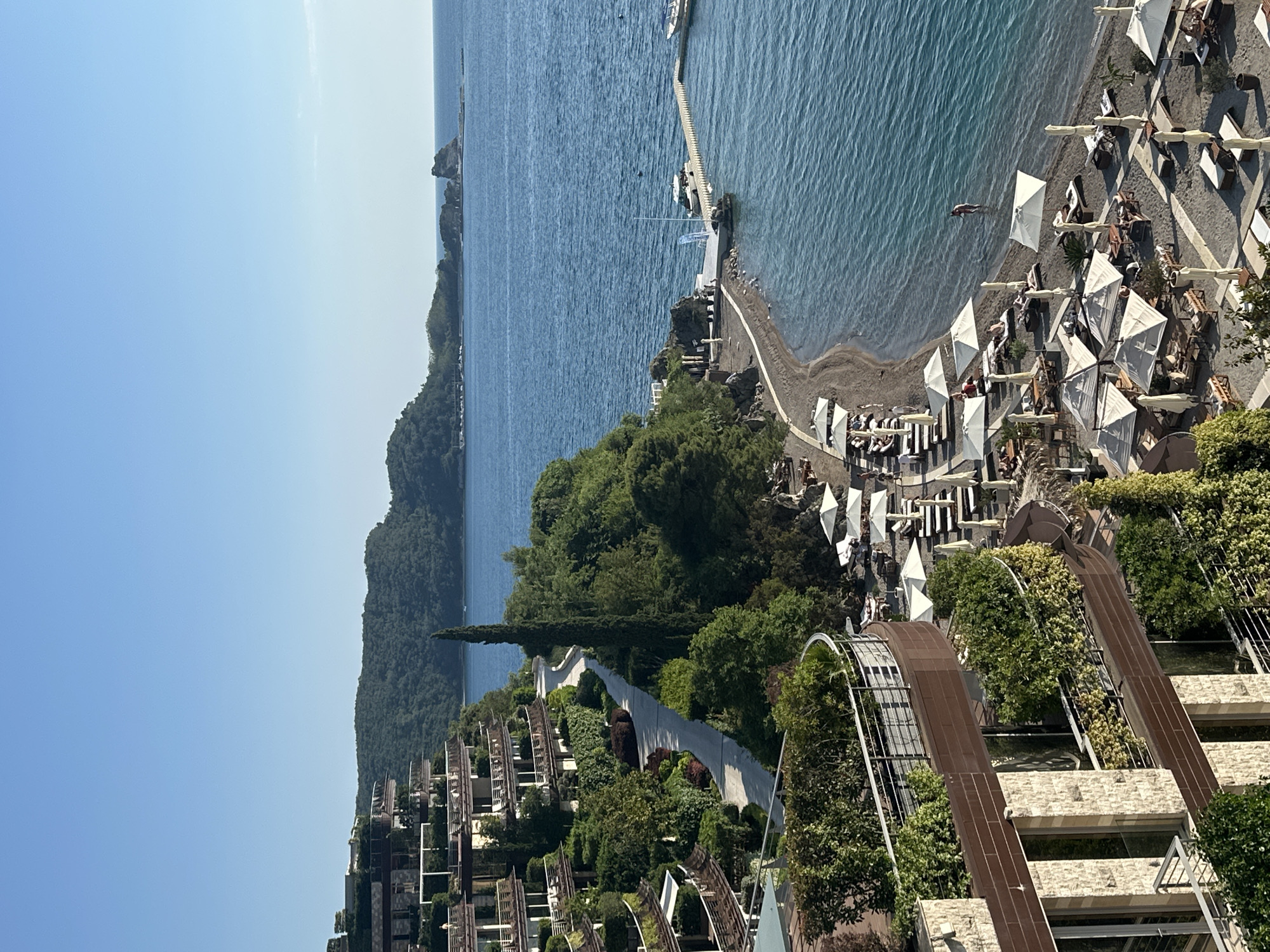 Beach day captured from above in Montenegro resort town