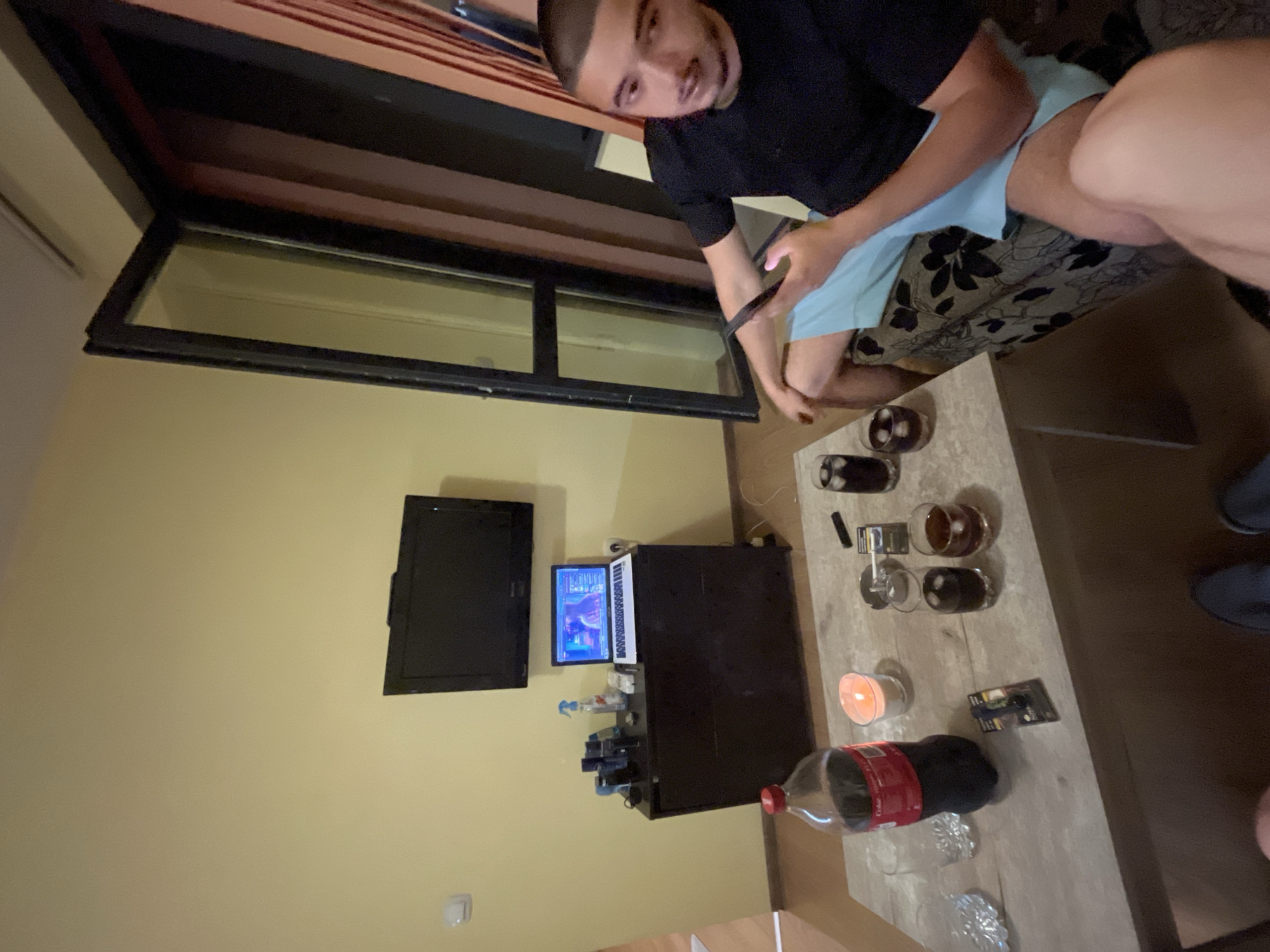 Two men gather for casual evening at Plovdiv residence