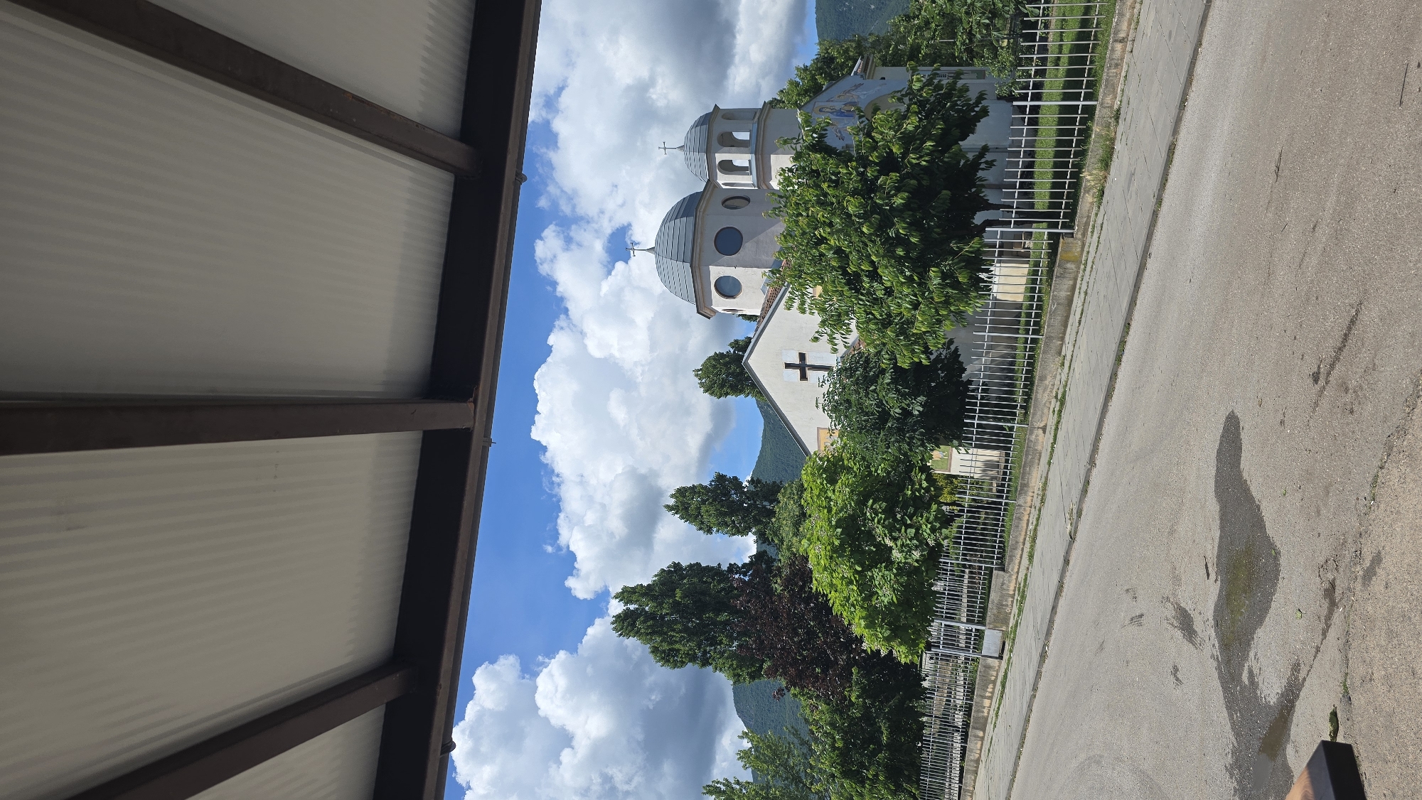 Morning scenes captured in Vratsa: church, cat, Coca-Cola can