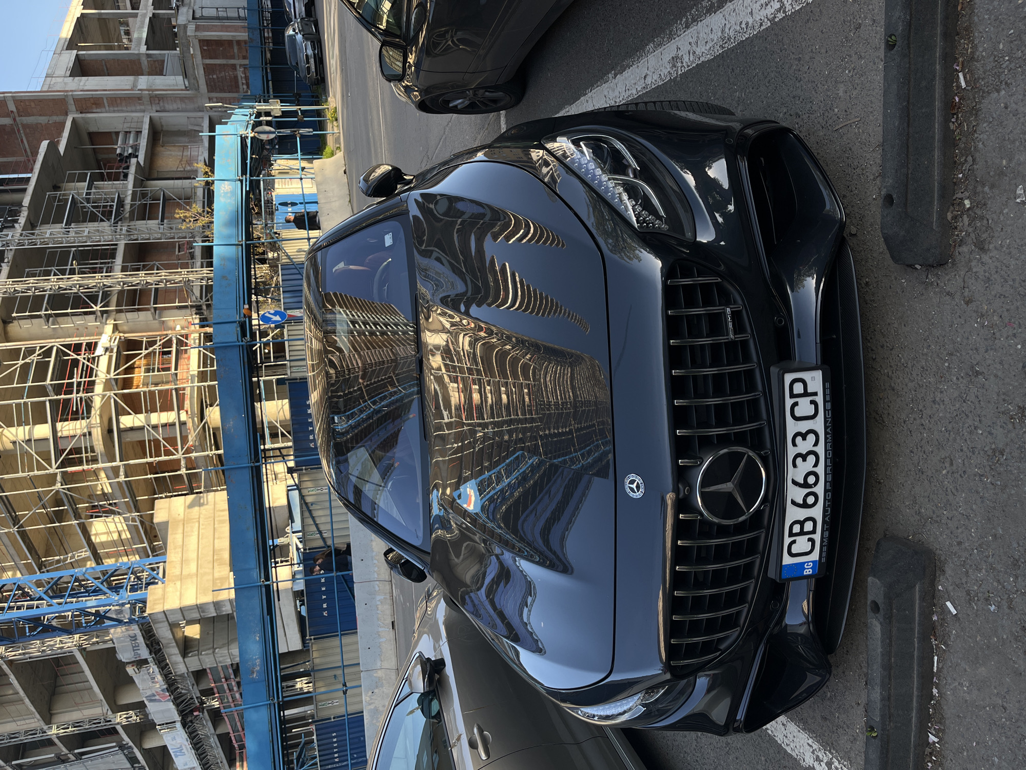 Luxury cars documented across Sofia locations during afternoon hours