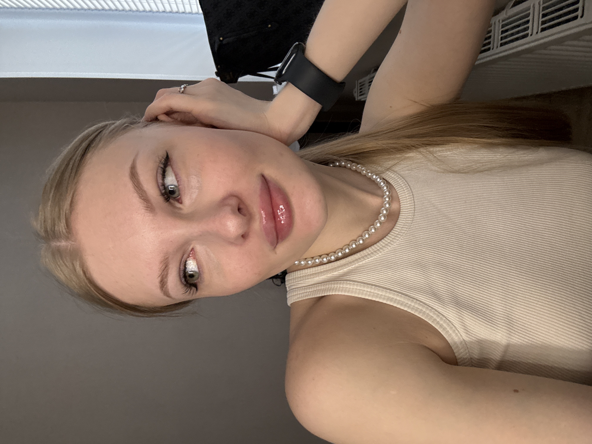 Woman takes multiple selfies during brief photo session in Perm