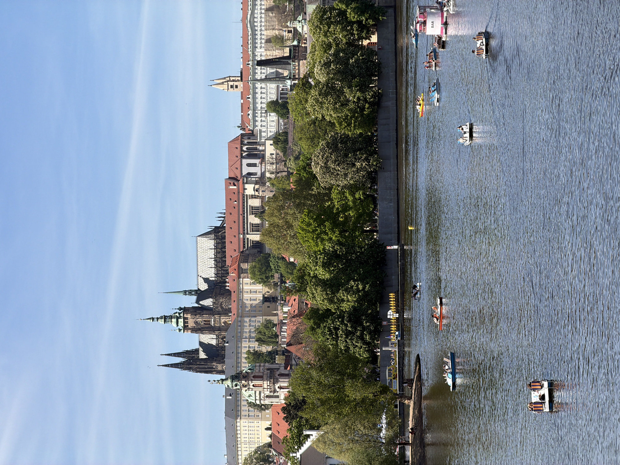 Paddle boats spotted on Prague's Vltava River near Charles Bridge