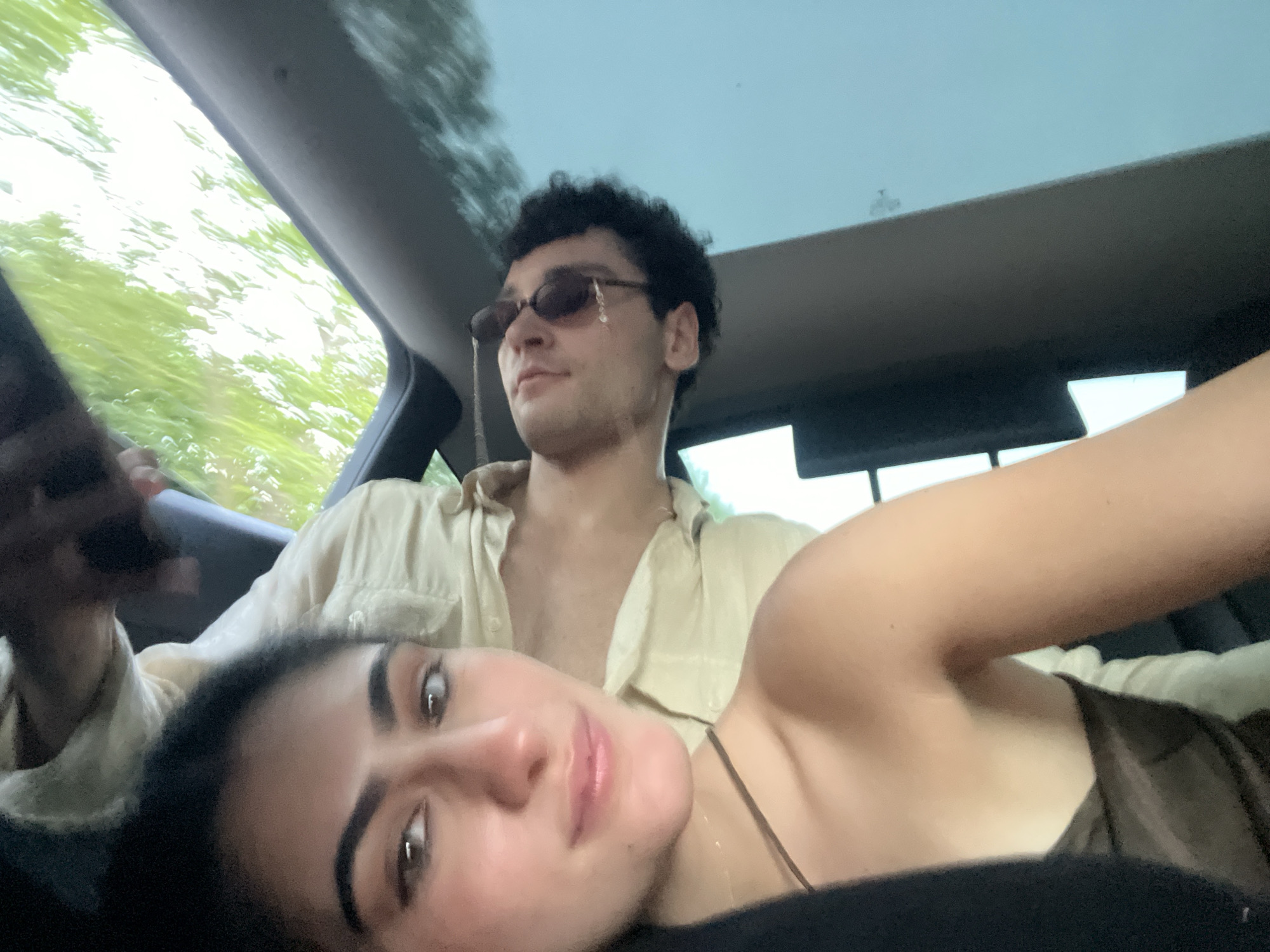 Late-night backseat moments in a Paris car