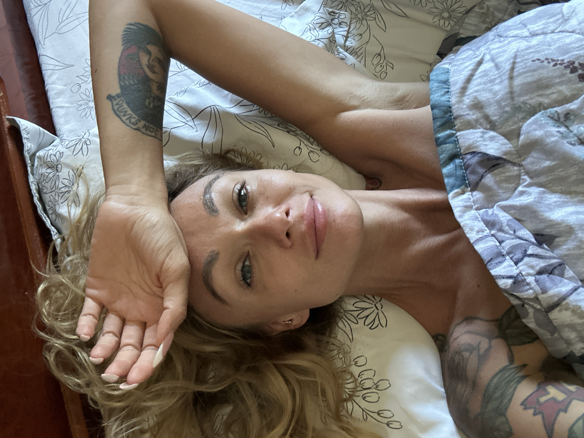 Late-night bed selfies from a Mũi Né hotel room