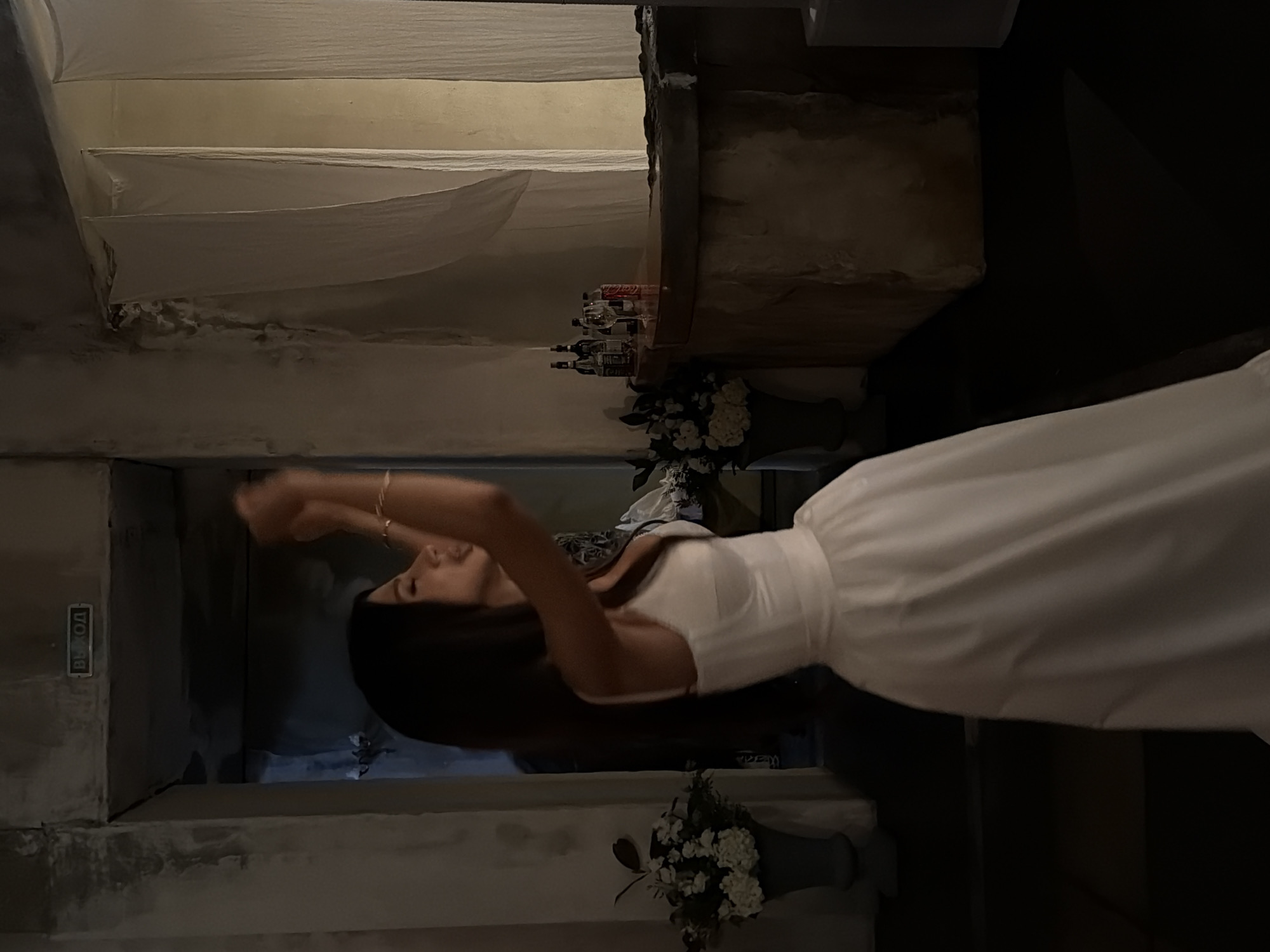 Woman in white dress spotted in concrete room, Bobrovo