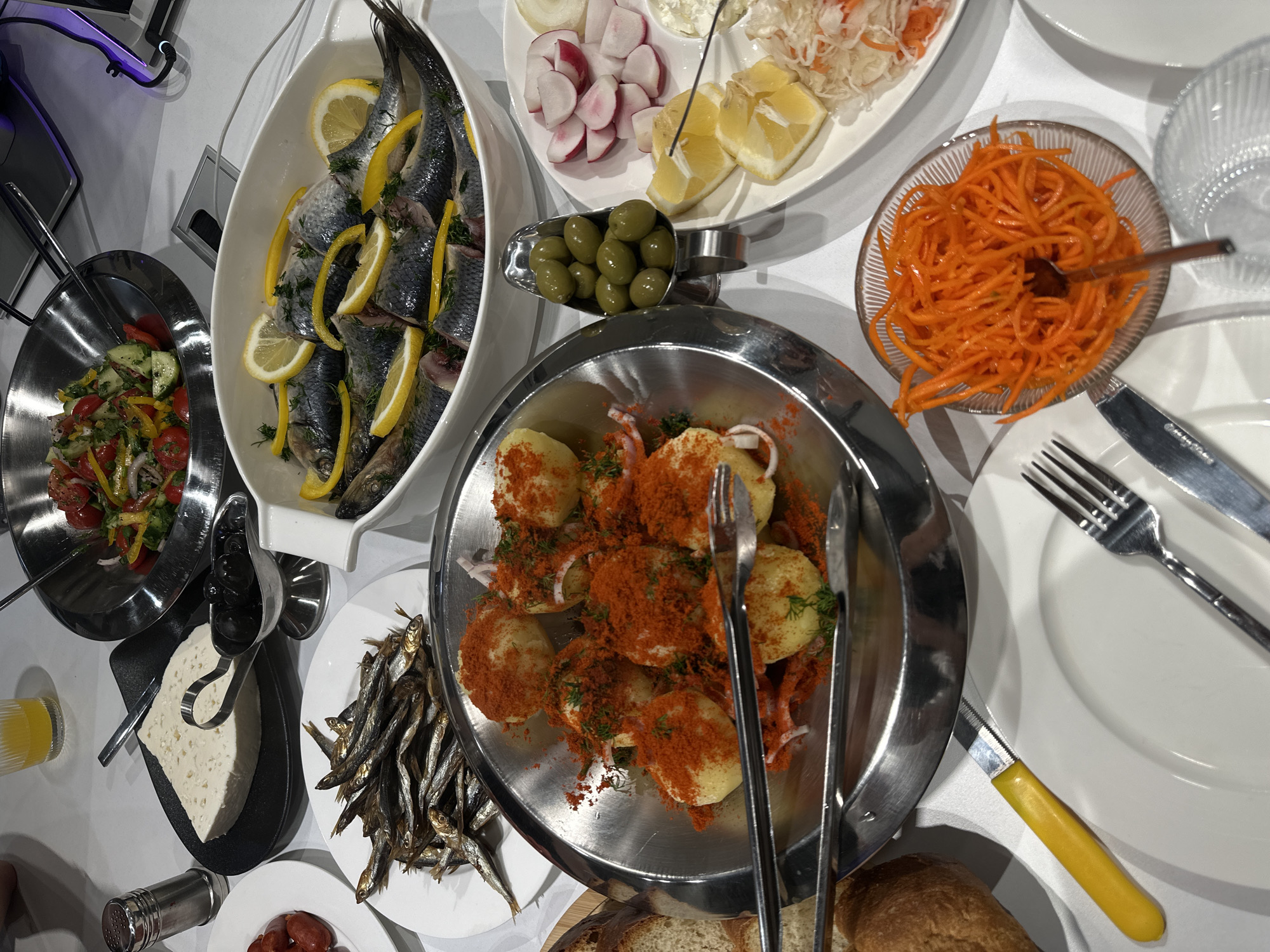 Home dinner party documented in Yerevan apartment with traditional spread