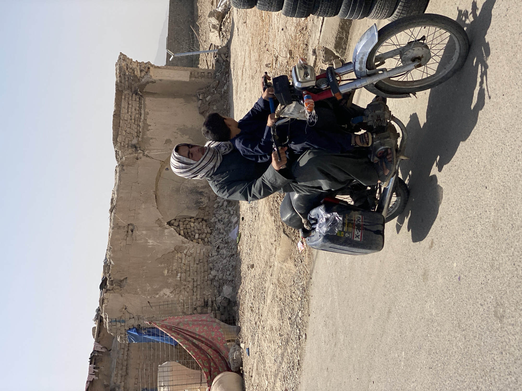 Everyday street life moving through central Kandahar