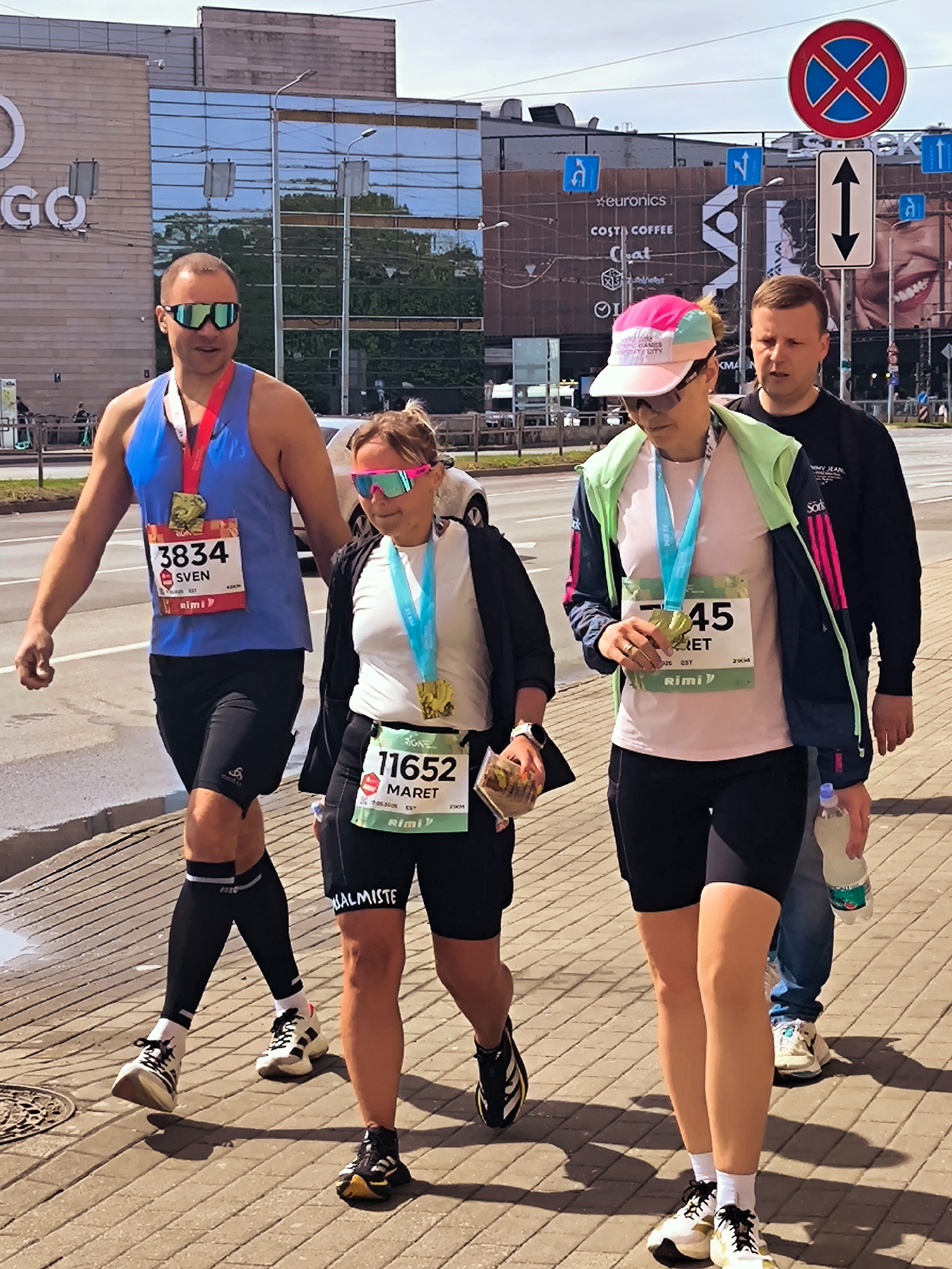 Sunday morning runners spotted on Riga sidewalk