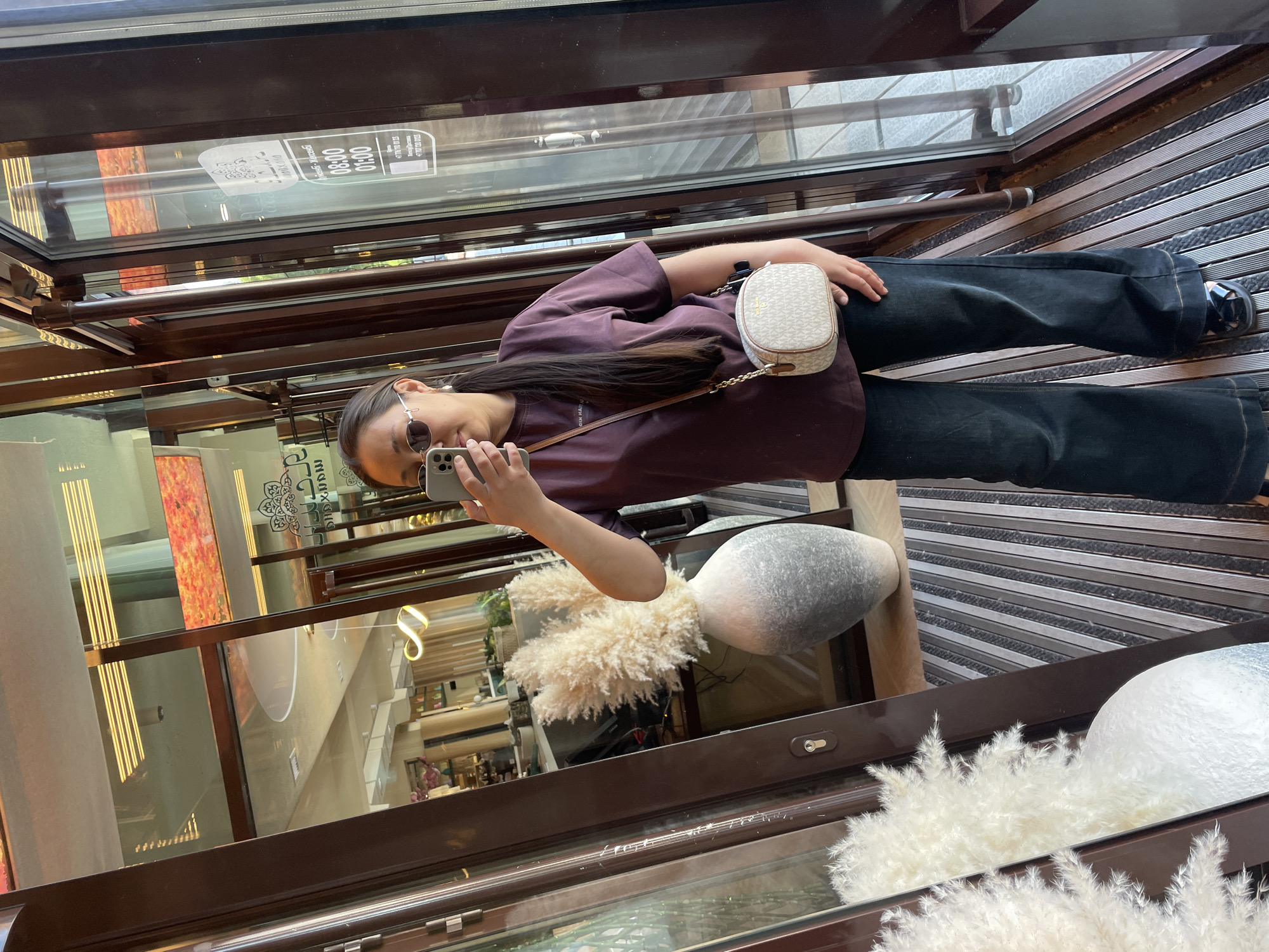 Woman dines at Kokshetau restaurant, documents experience with photos