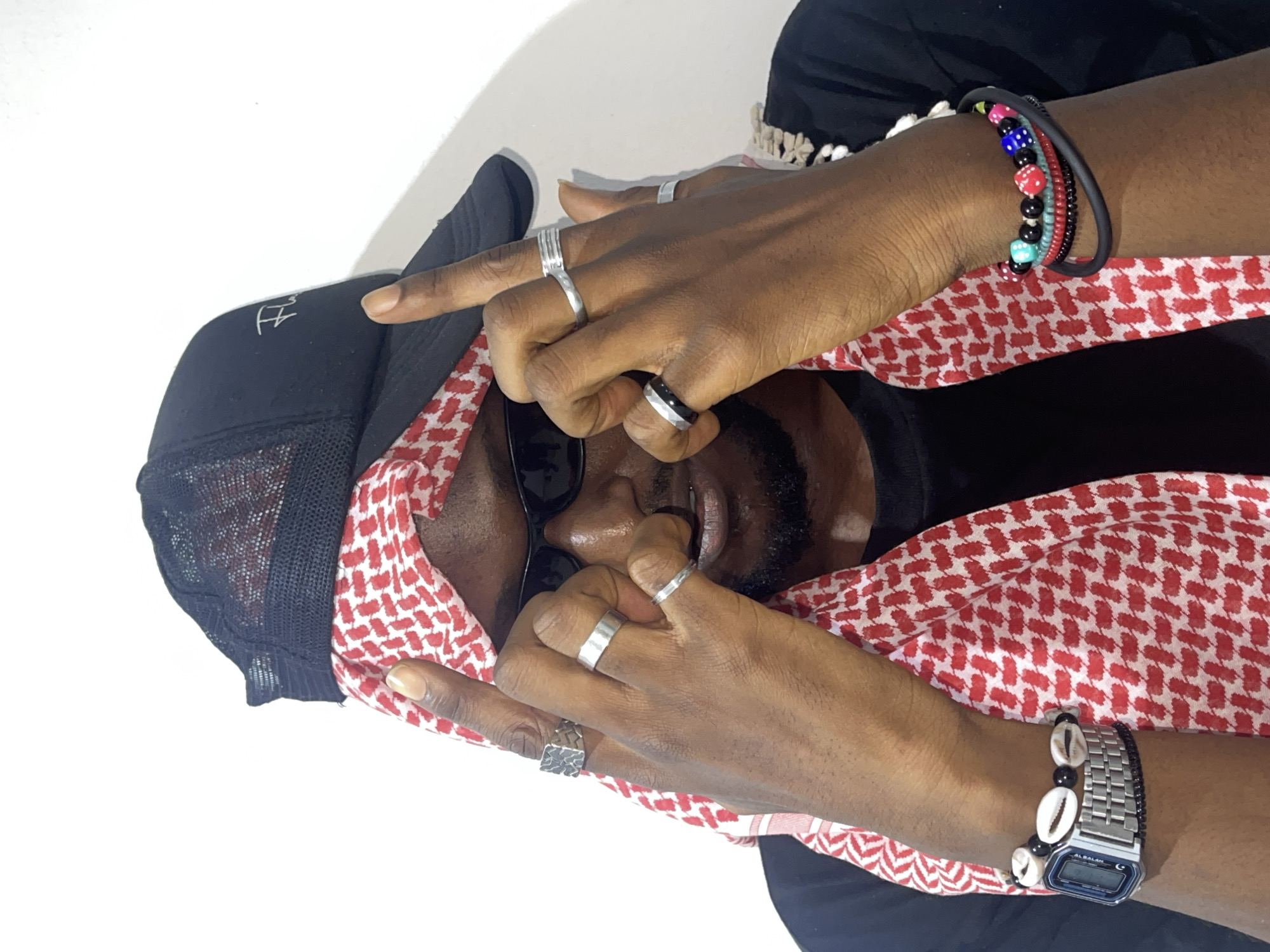 Styled portrait session in Abuja, mixing streetwear and keffiyeh.