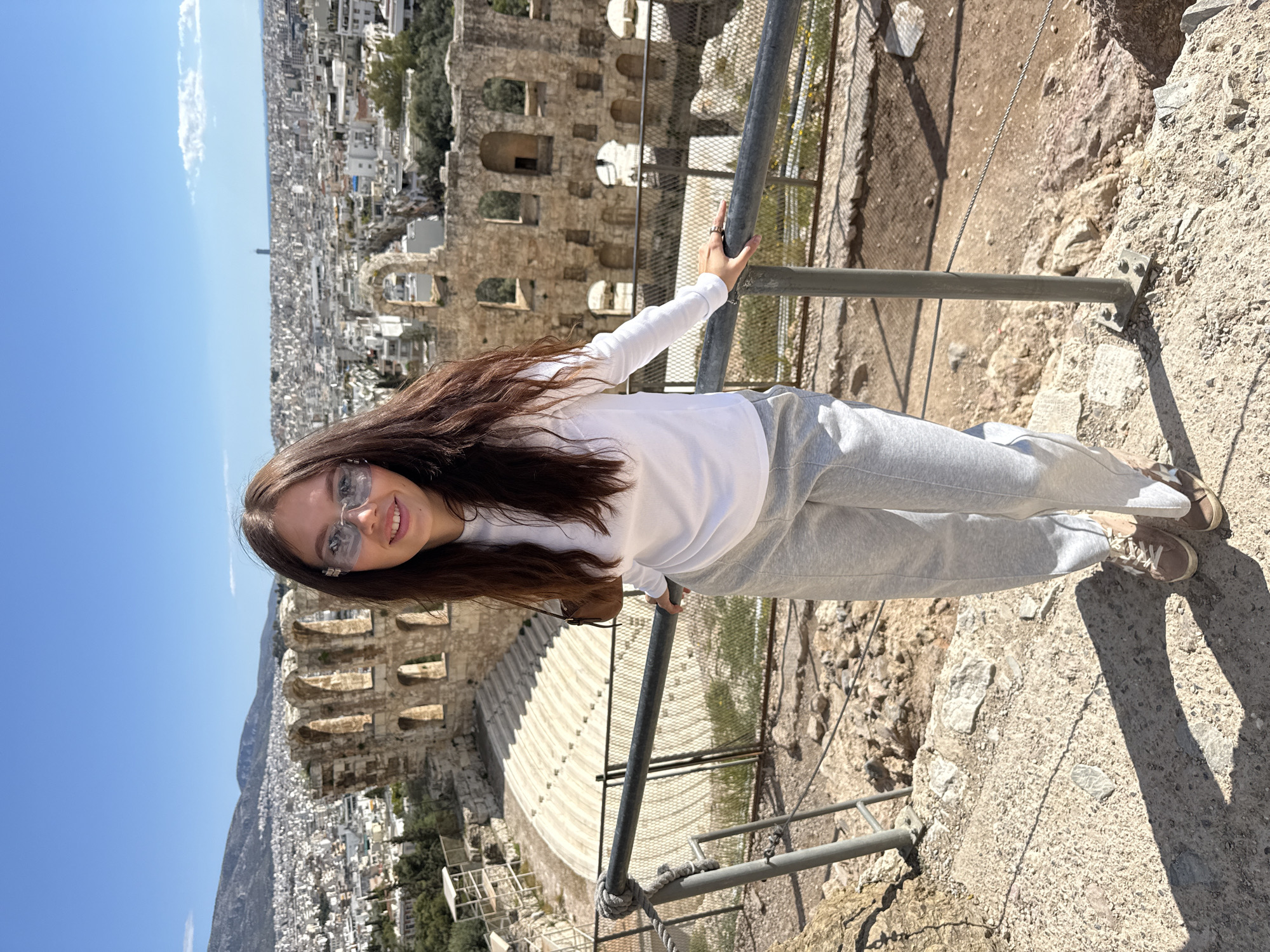 Tourists visit ancient Odeon theater on Athens Acropolis