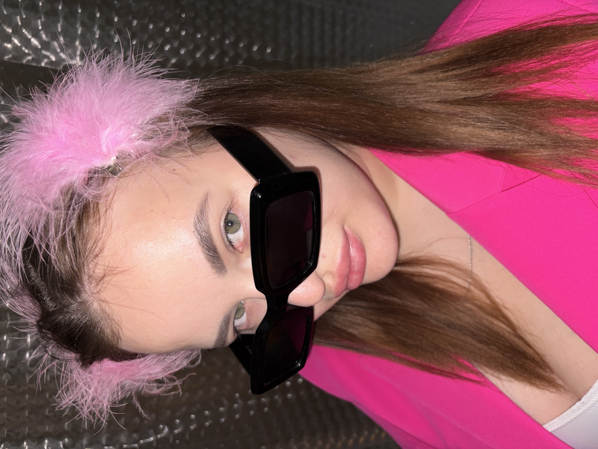 Woman poses for portrait in Krasnodar wearing pink accessories