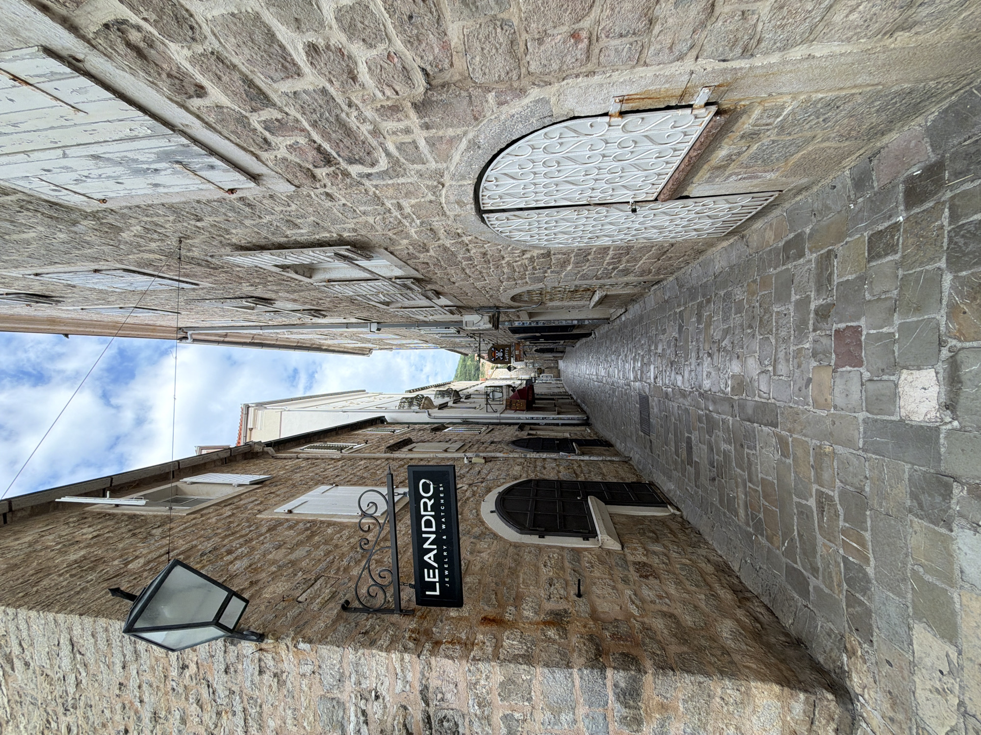 Tourist documents stone streets and architecture in Budva Montenegro