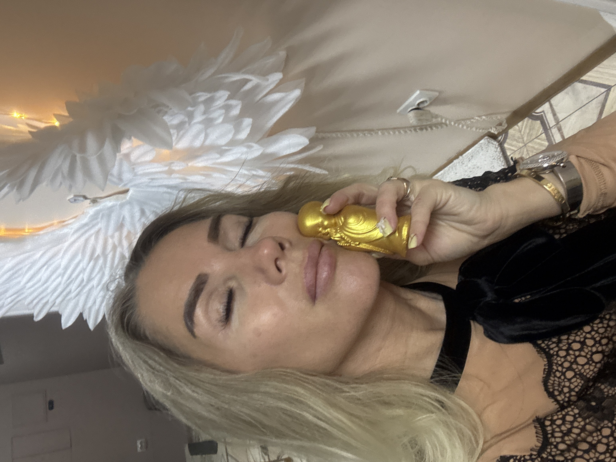 Woman in black lace photographed with decorative objects in Abakan
