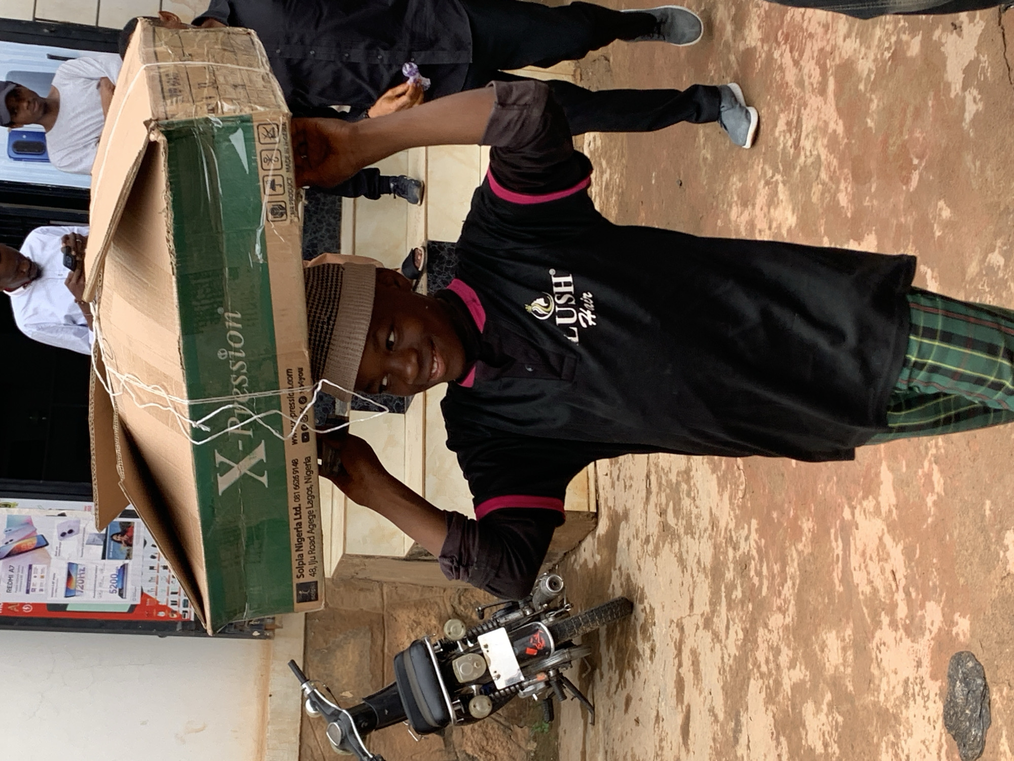 Daily life unfolds on Jos streets during midday hours