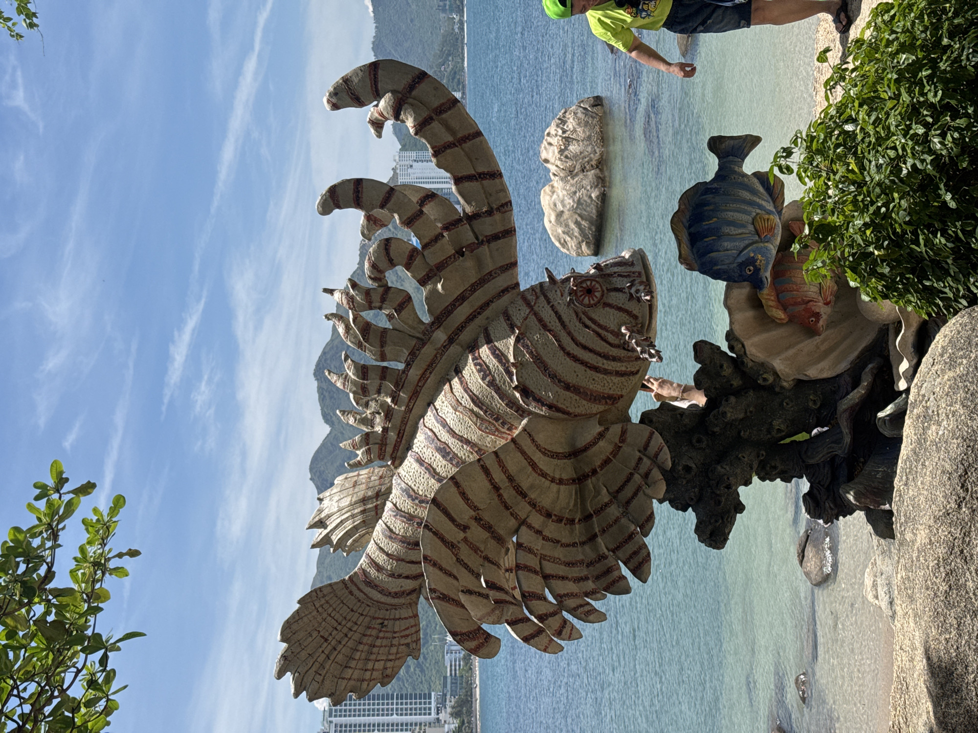 Nha Trang courtyard scenes: lotus ponds, beach sculpture, live music