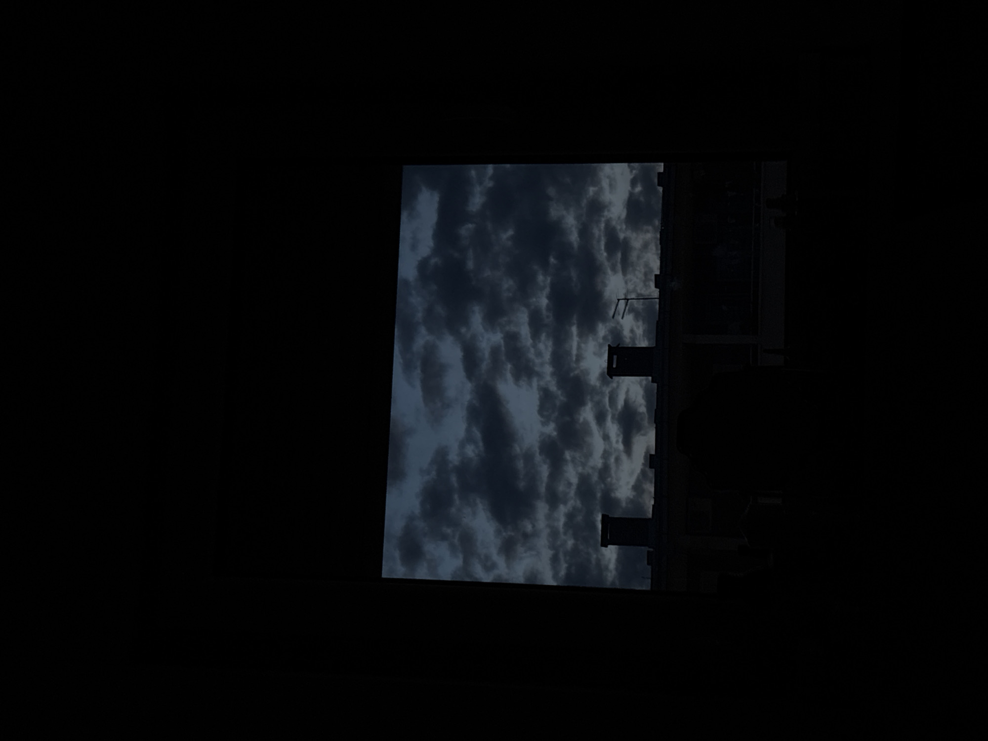 Dense dark clouds observed over Kragujevac, Serbia buildings
