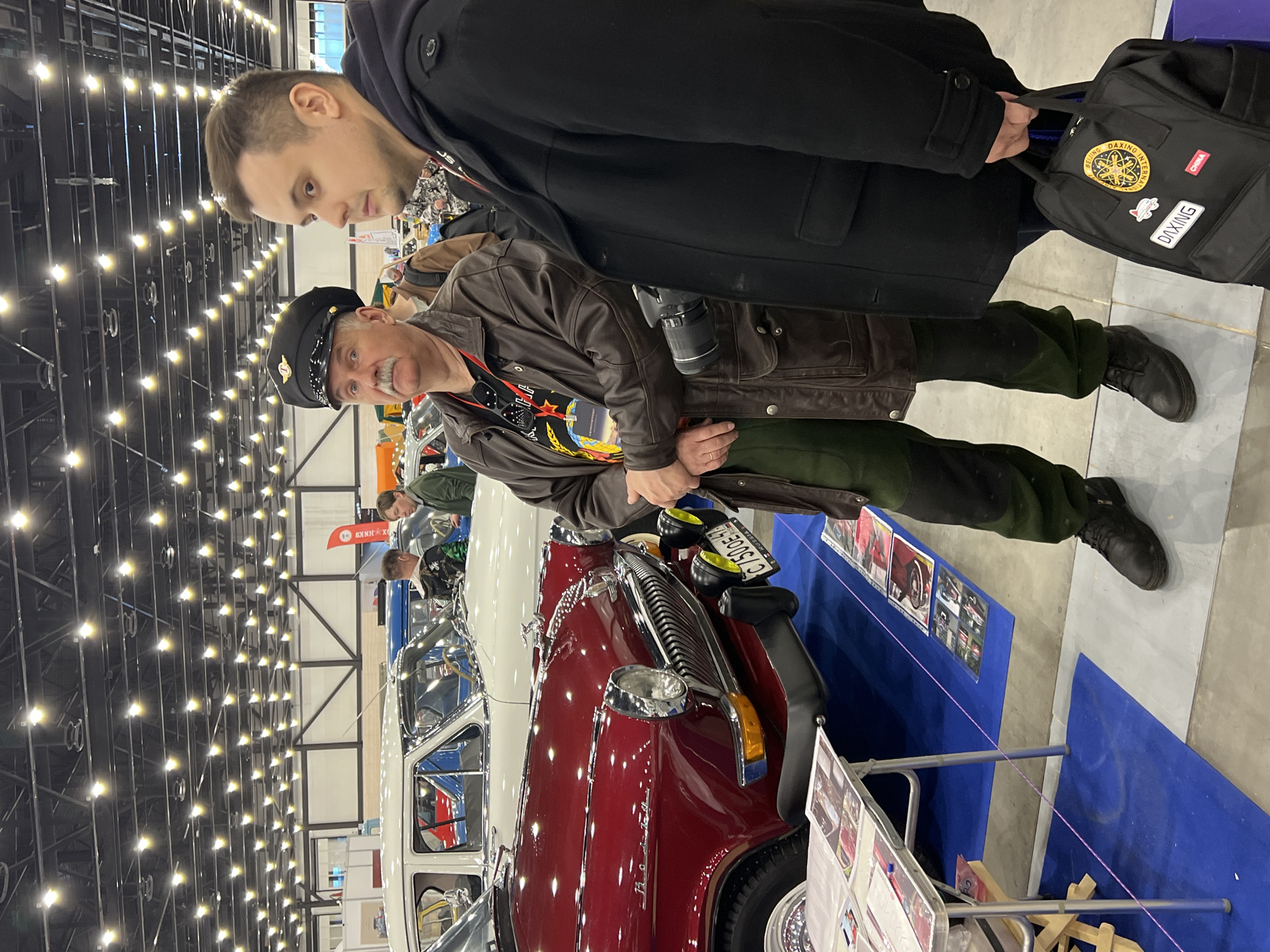 Indoor car show features exposed chassis displays in Shushary