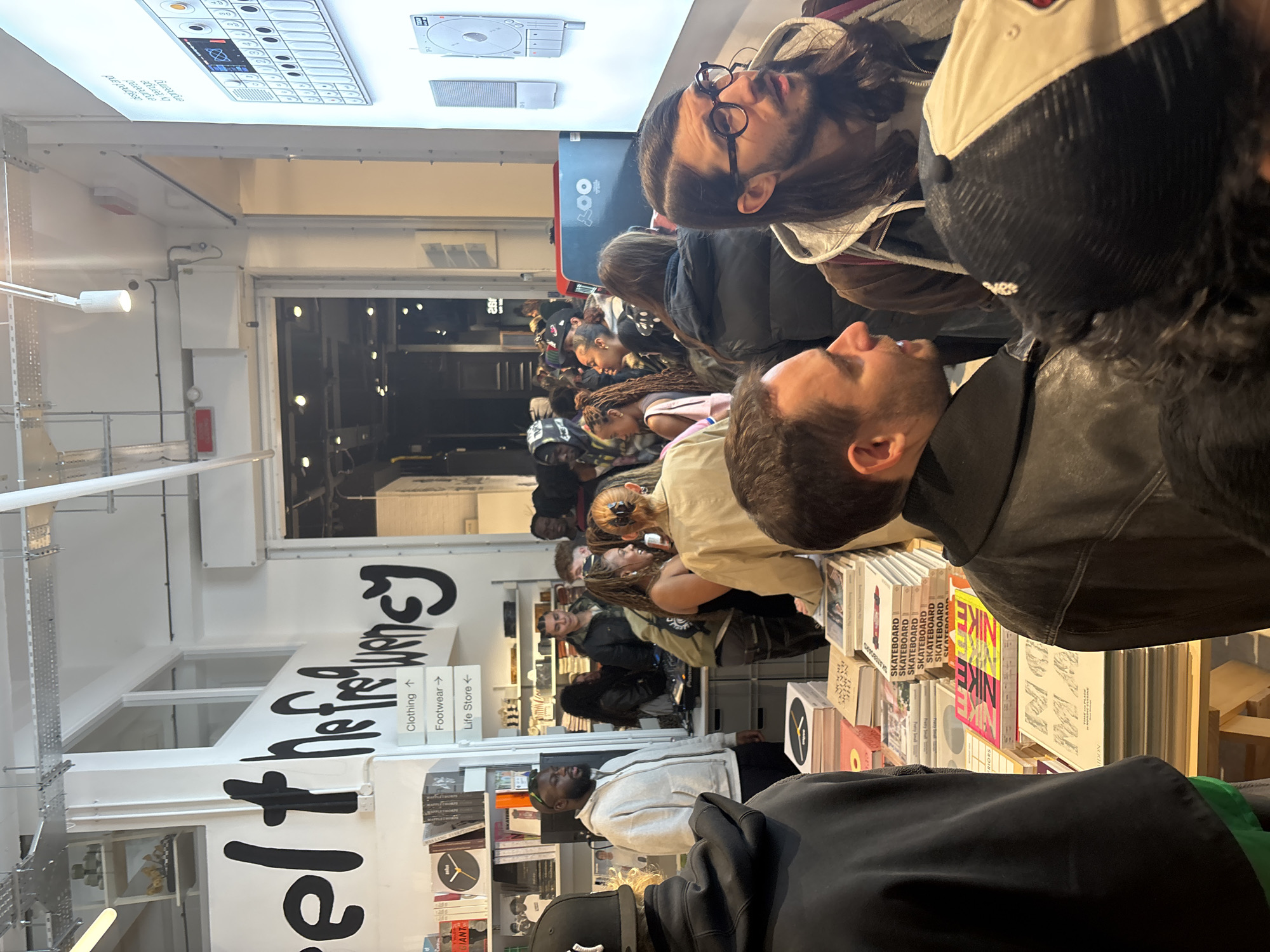 People gather inside London retail store
