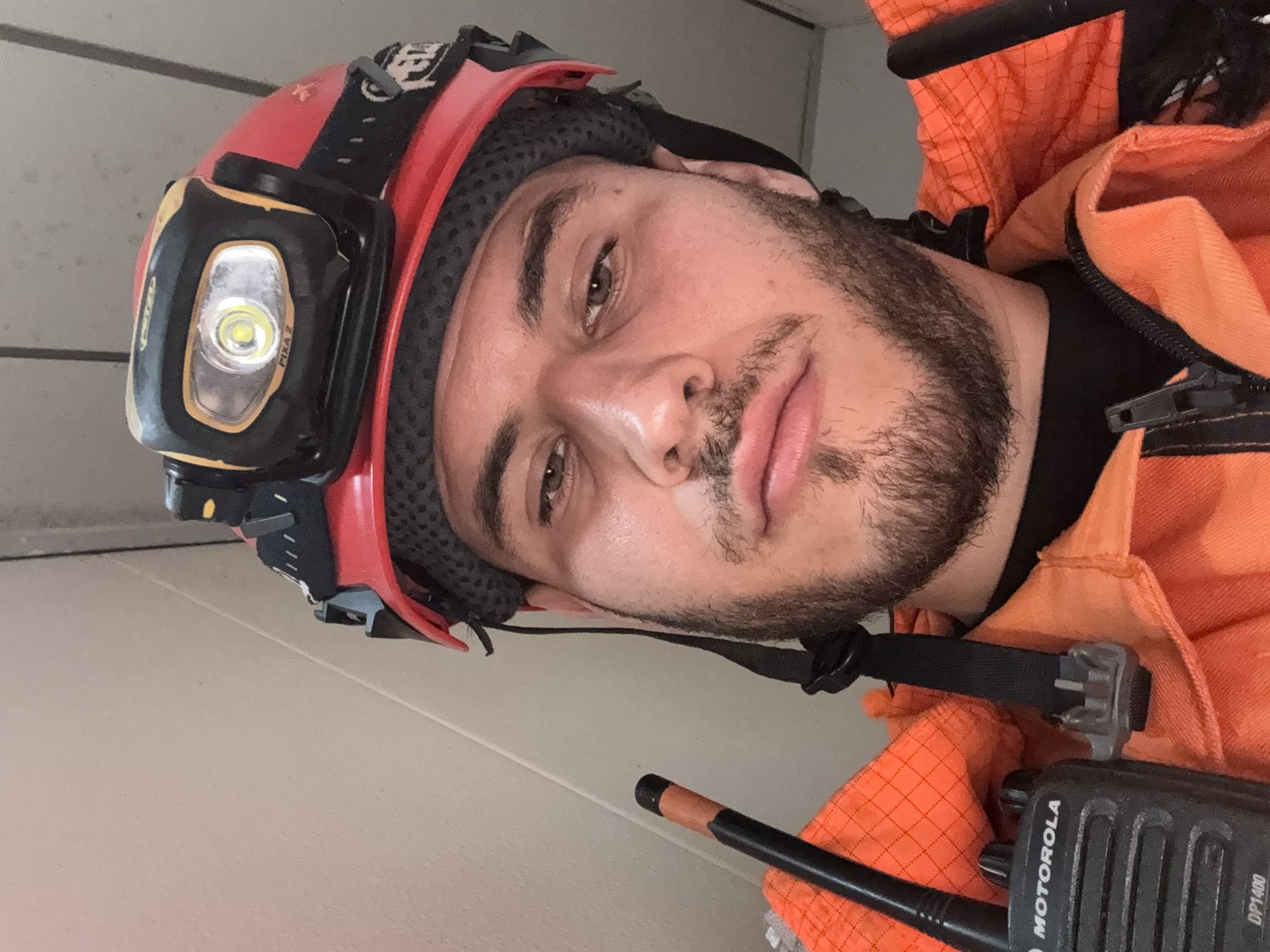 Worker in safety gear takes selfie in Brest