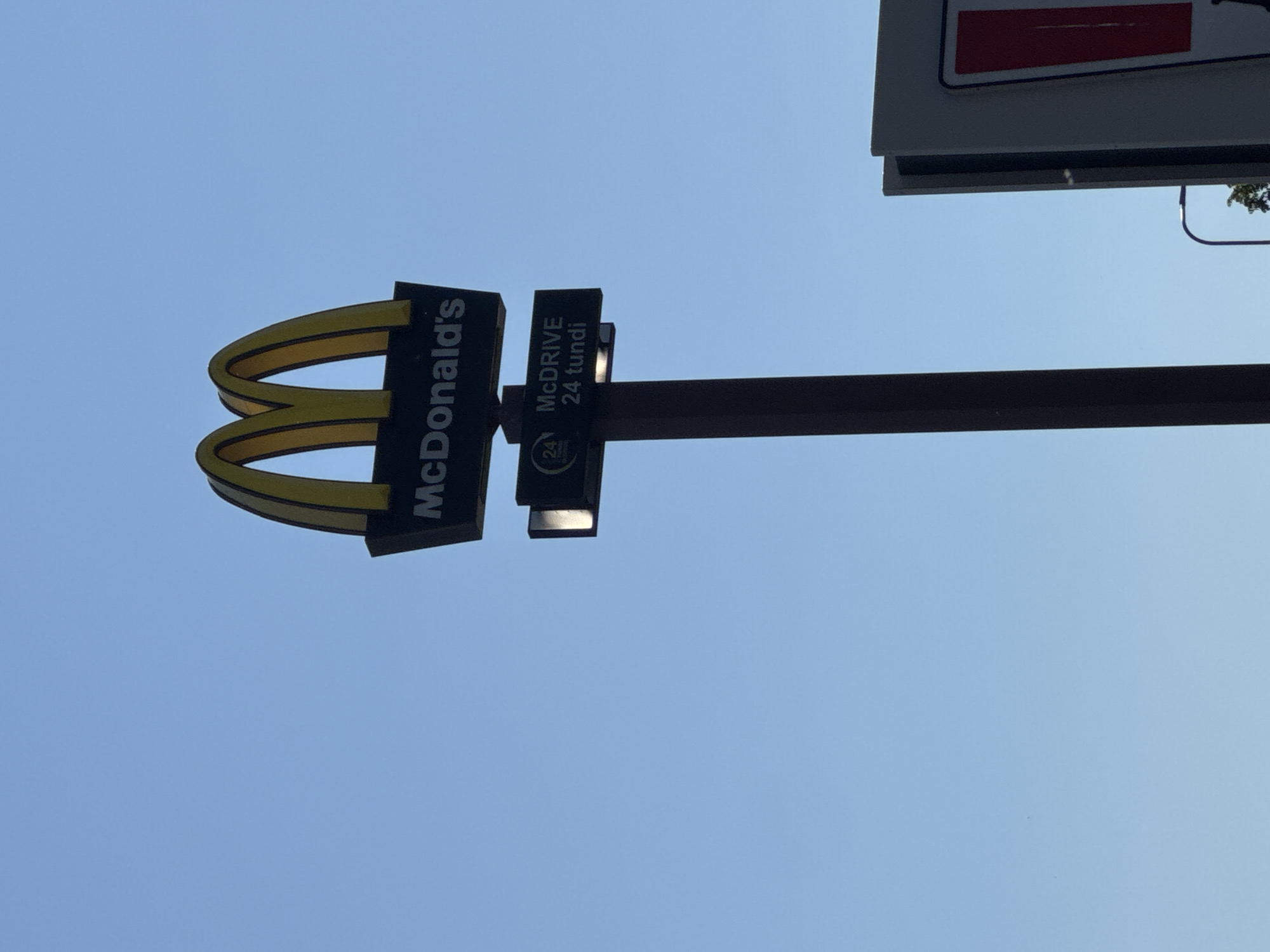 Clear morning captures McDonald's and modern buildings in Tallinn