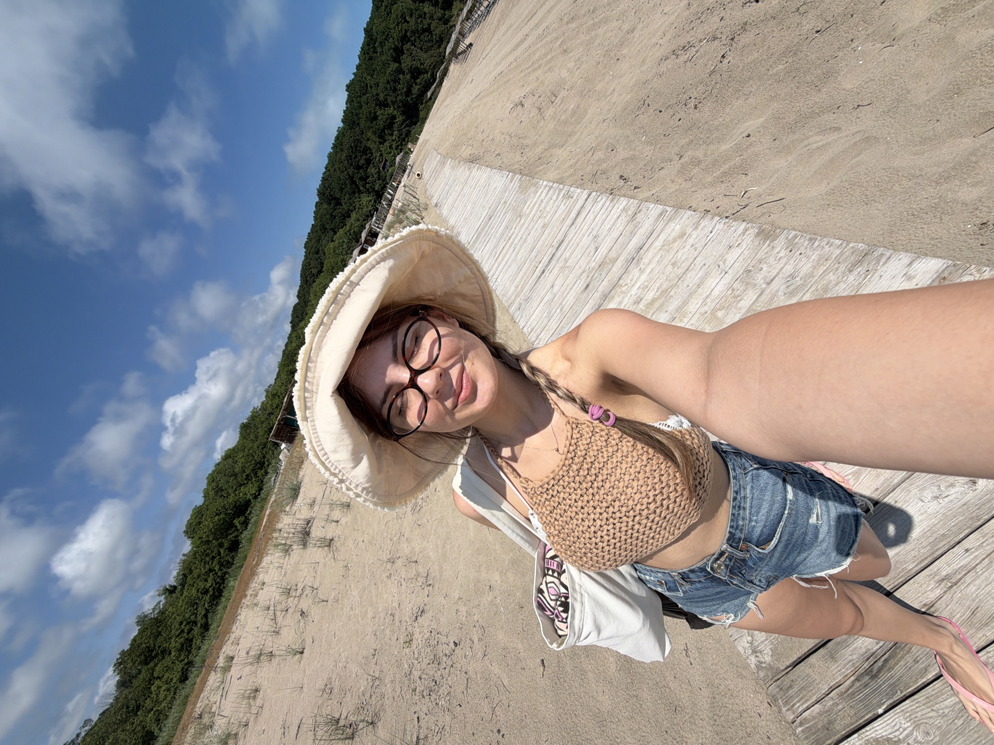 Woman takes selfie on Rezovo beach, Bulgaria