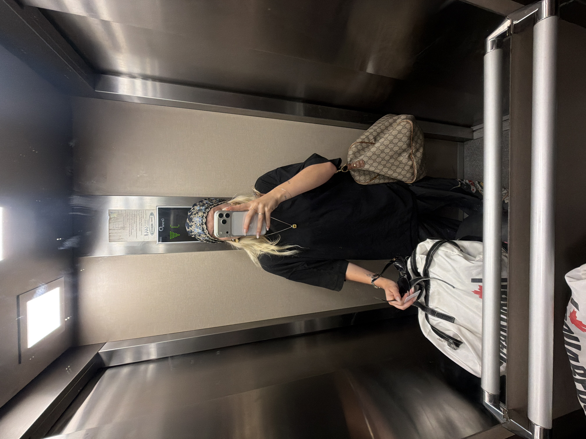Person takes elevator selfie in Kenitra, Morocco