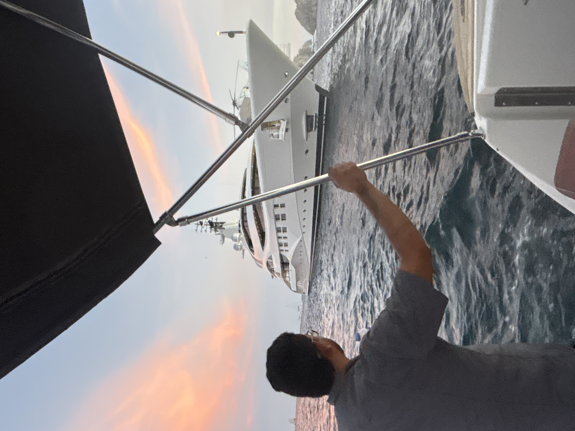 Luxury yachts spotted in Cabo San Lucas harbor at sunset
