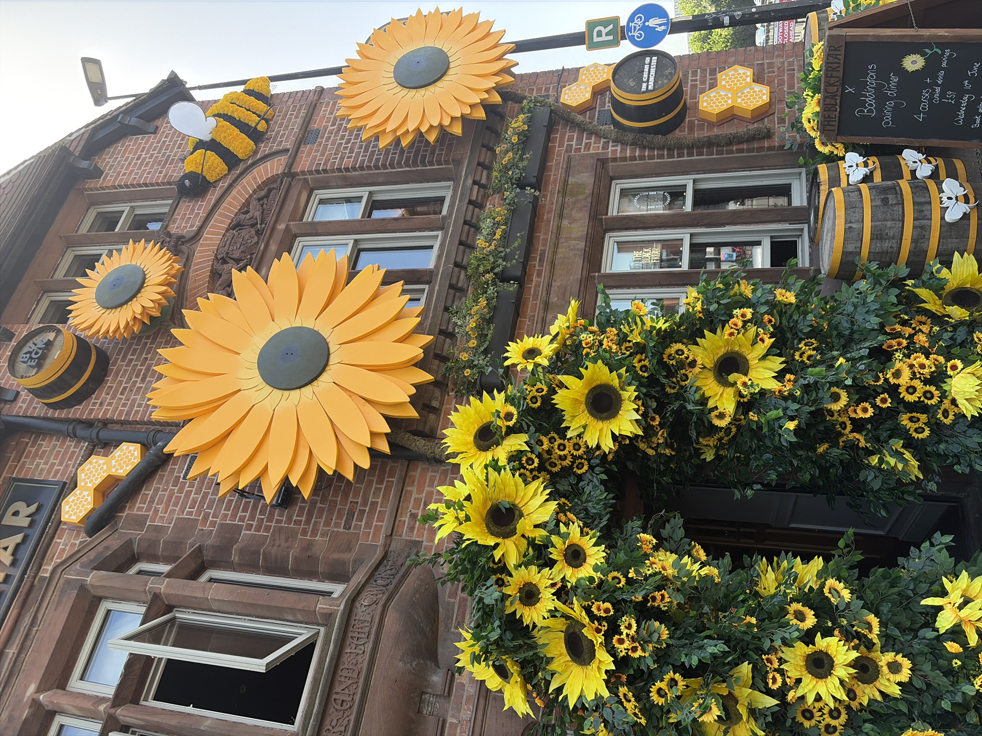 Social gathering documented at bee-themed Salford pub