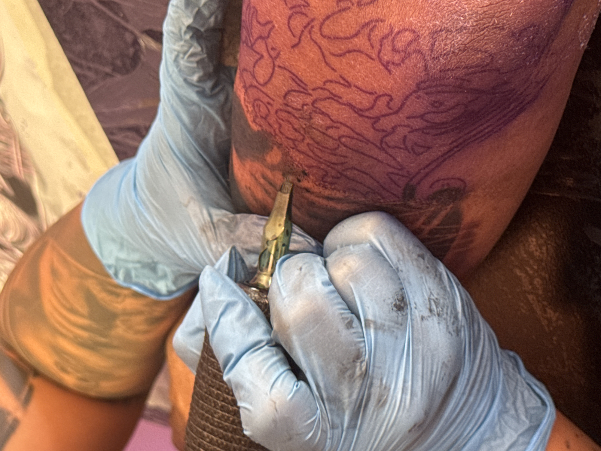 Tattoo in progress, needle to skin in Vigo
