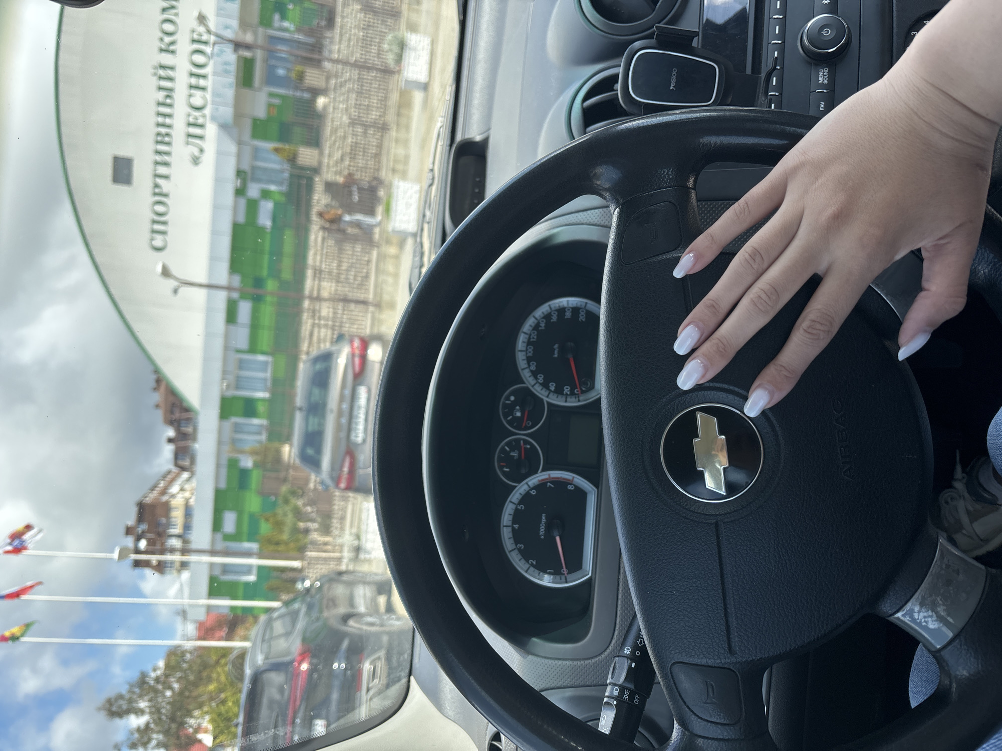 Woman photographed driving Chevrolet in Sochi, Russia