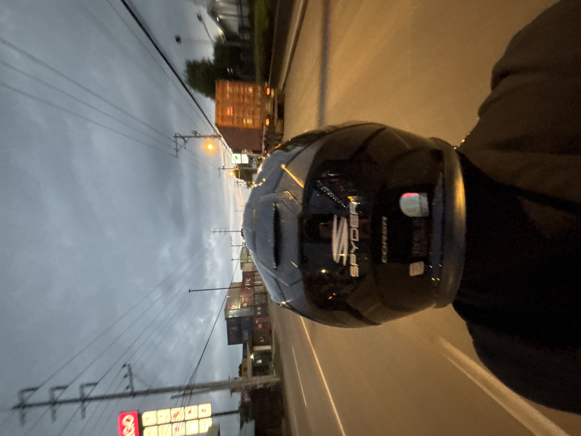 Twilight motorcycle ride through urban Davao City streets
