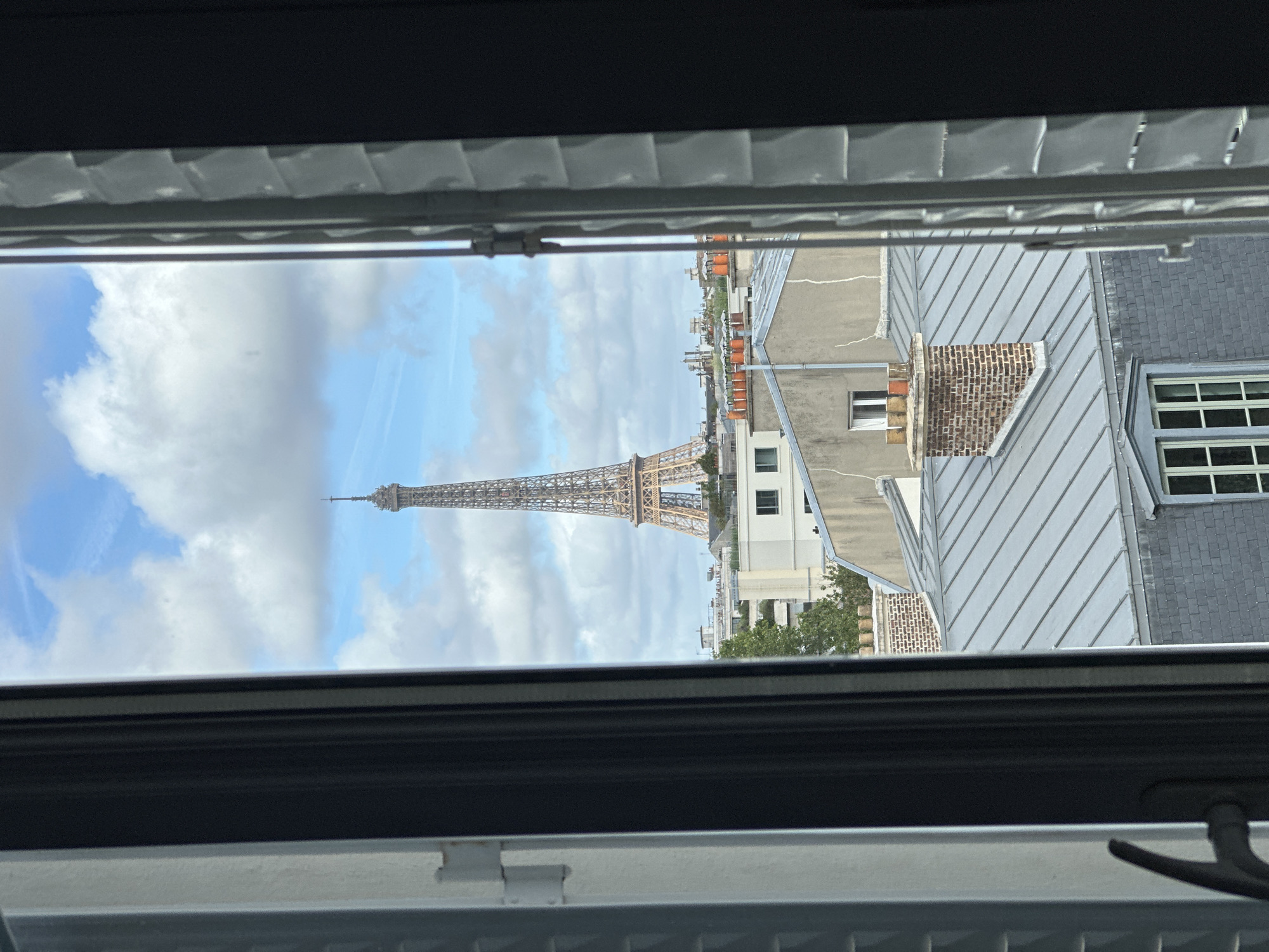 Morning Paris cityscape views captured from elevated positions show Eiffel Tower